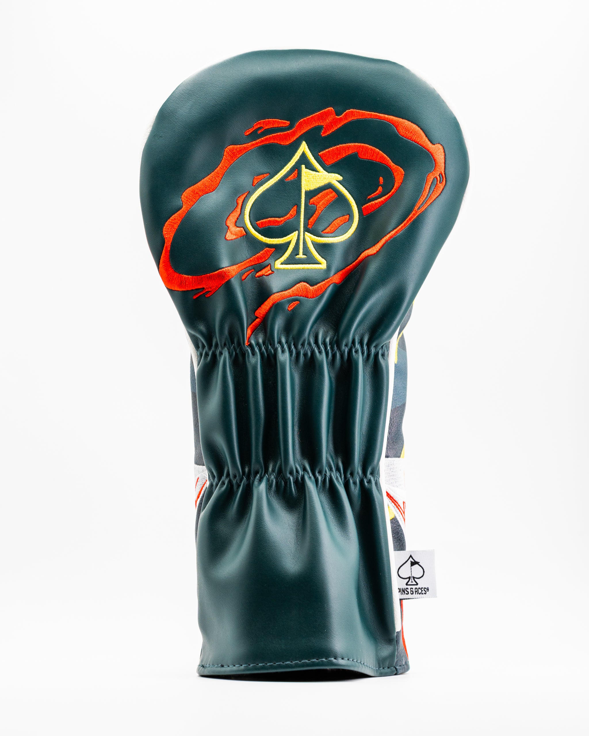 Bold green driver cover featuring a striking orange swirl design and an ace of spades emblem, perfect for standout golfers.