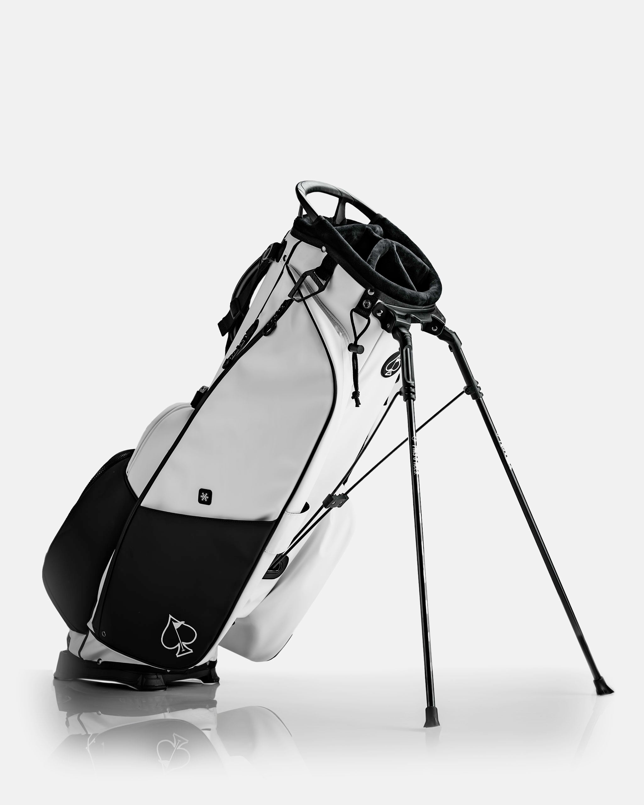 Alt text: Player Preferred™ Golf Bag in Domino design, featuring a sleek, modern look with multiple pockets and a comfortable strap, set against a neutral background.