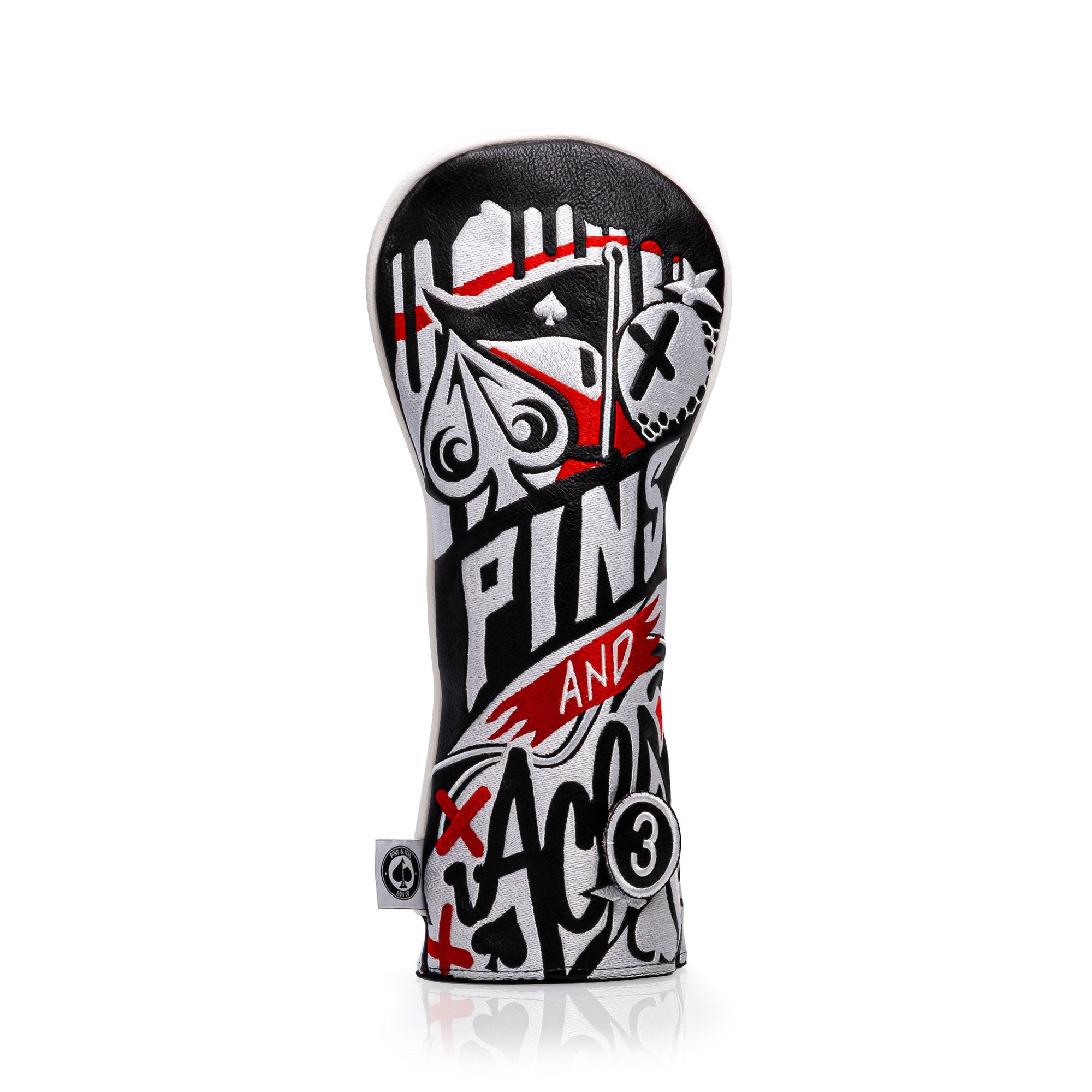 Bold black, white, and red golf headcover with graffiti-style designs, featuring playful text and symbols for standout style.