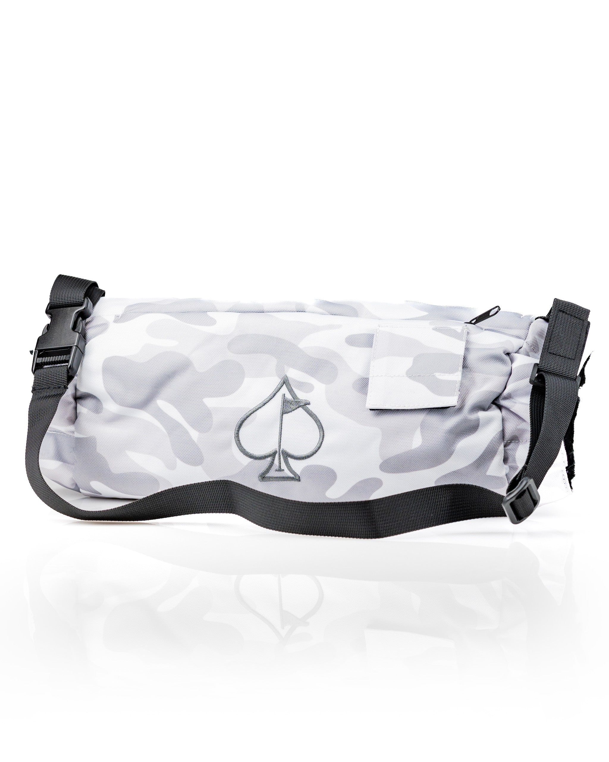 Stylish electric hand warmer in a gray camouflage design, featuring the Pins and Aces logo and an adjustable strap.