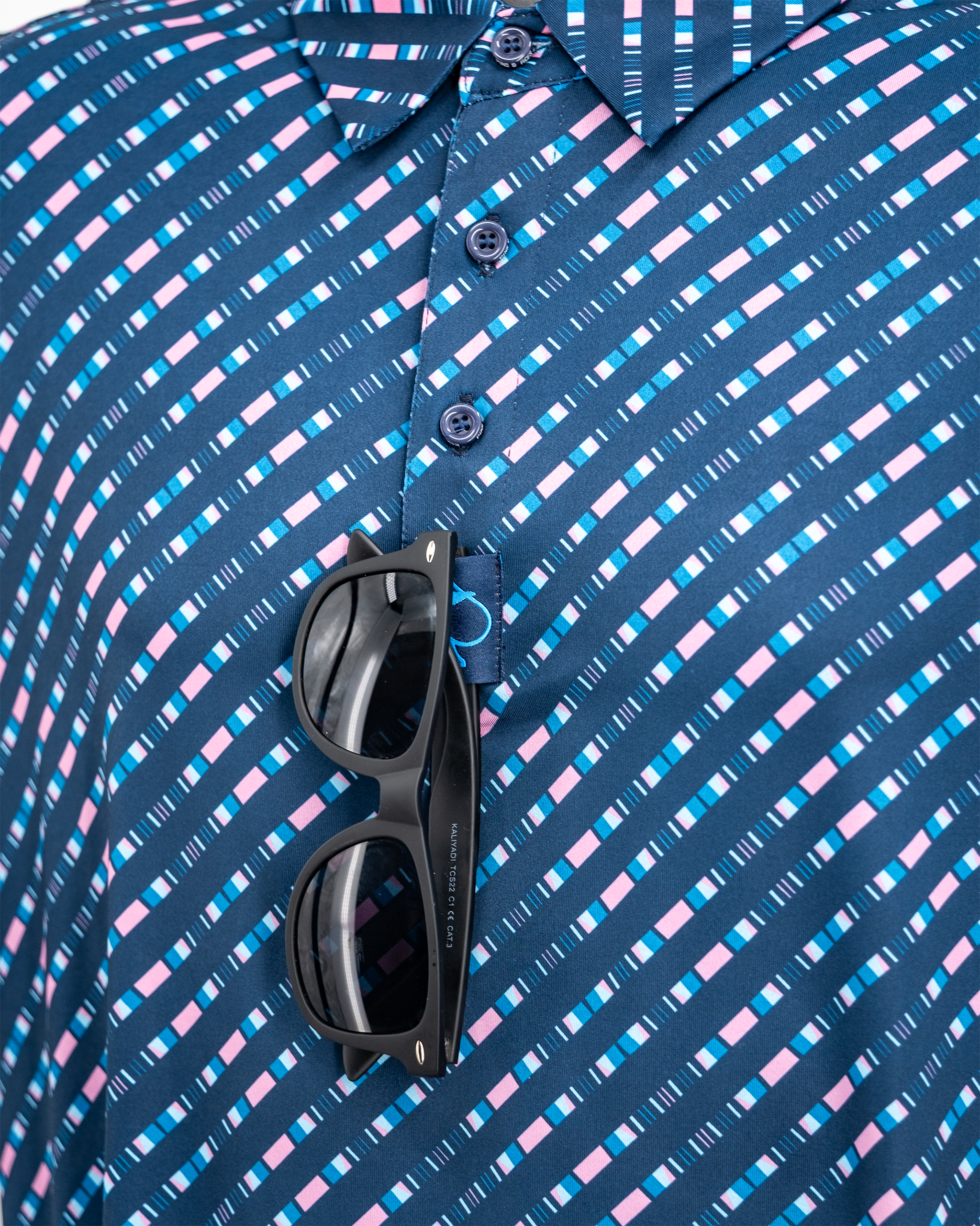 Chromo Blue hanging polo shirt with a stylish design and vibrant color.