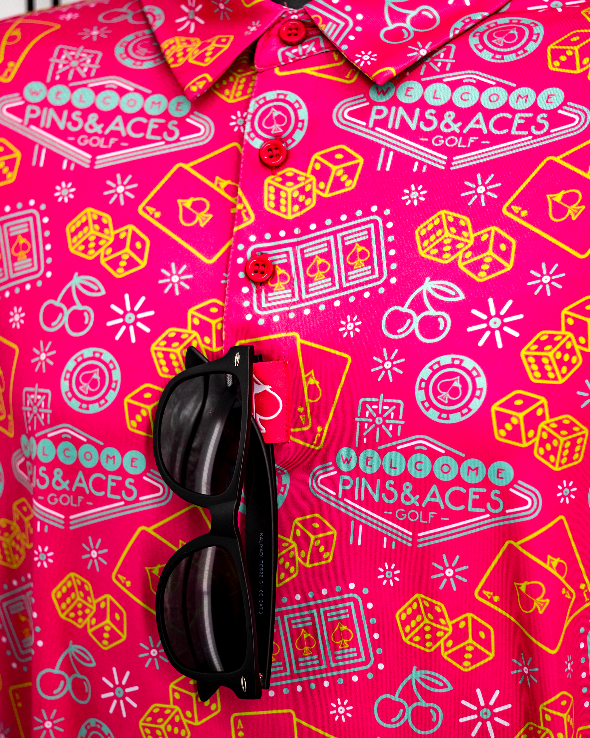 Big Ace Fuchsia polo shirt displayed on a hanger, showcasing its vibrant fuchsia color and modern design.