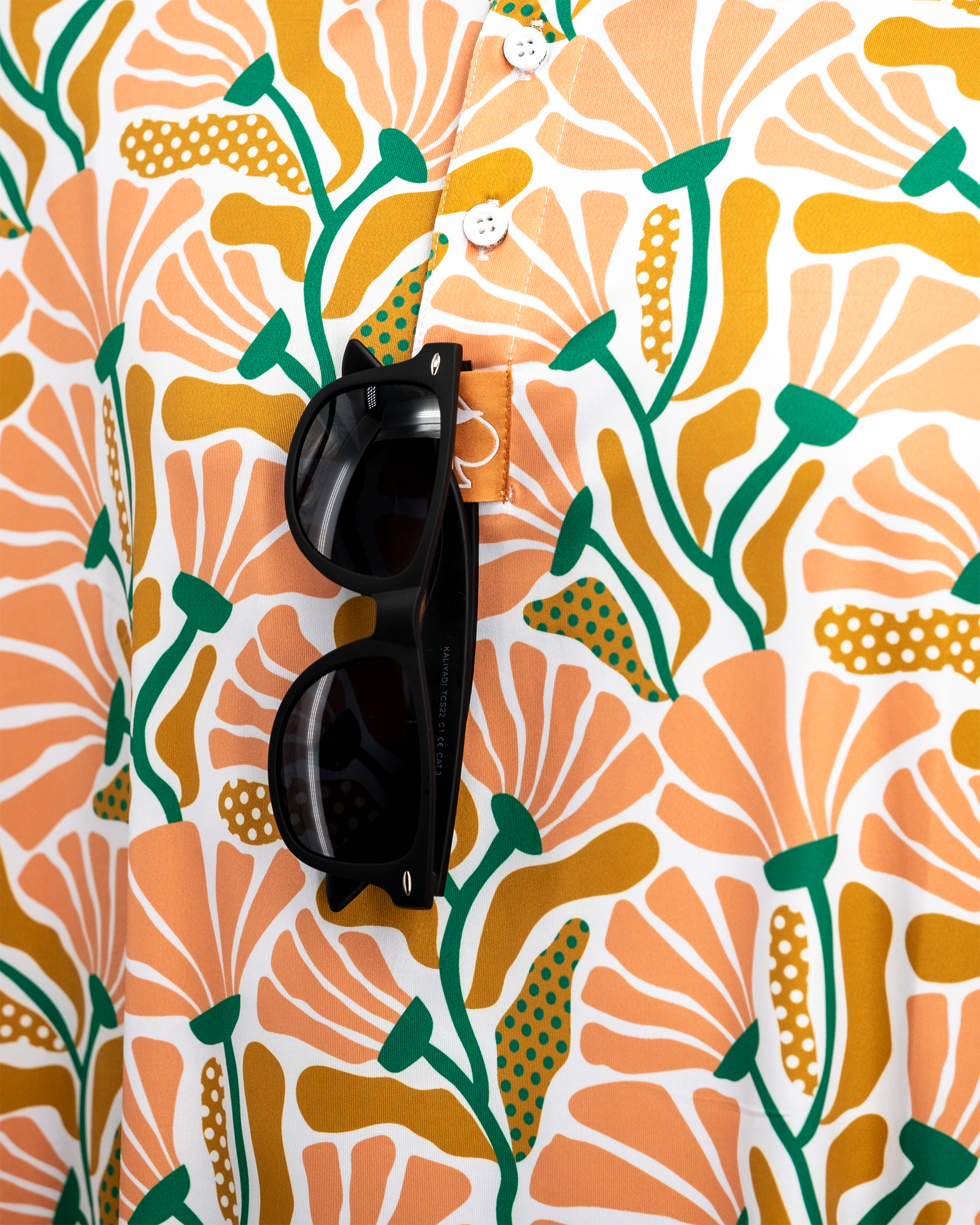 Garden Party Spritz beverage in a decorative can, featuring colorful floral designs and a vibrant summer theme.