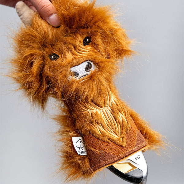 Furry, orange lion headcover with embroidered eyes and nose, designed for bold, standout golf accessories.