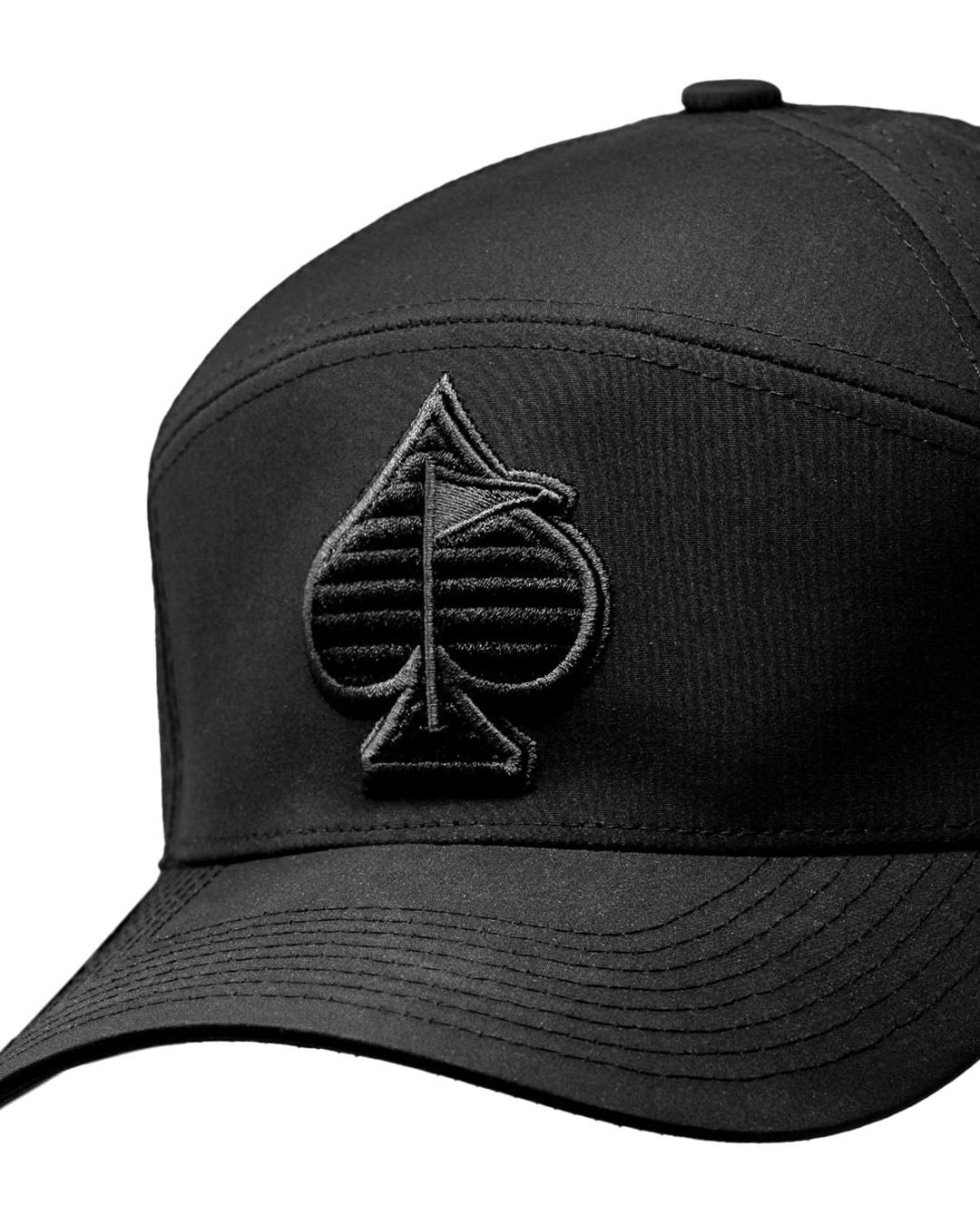Black Tradesman Hat showcasing a structured design and front logo patch, ideal for outdoor work and casual wear.