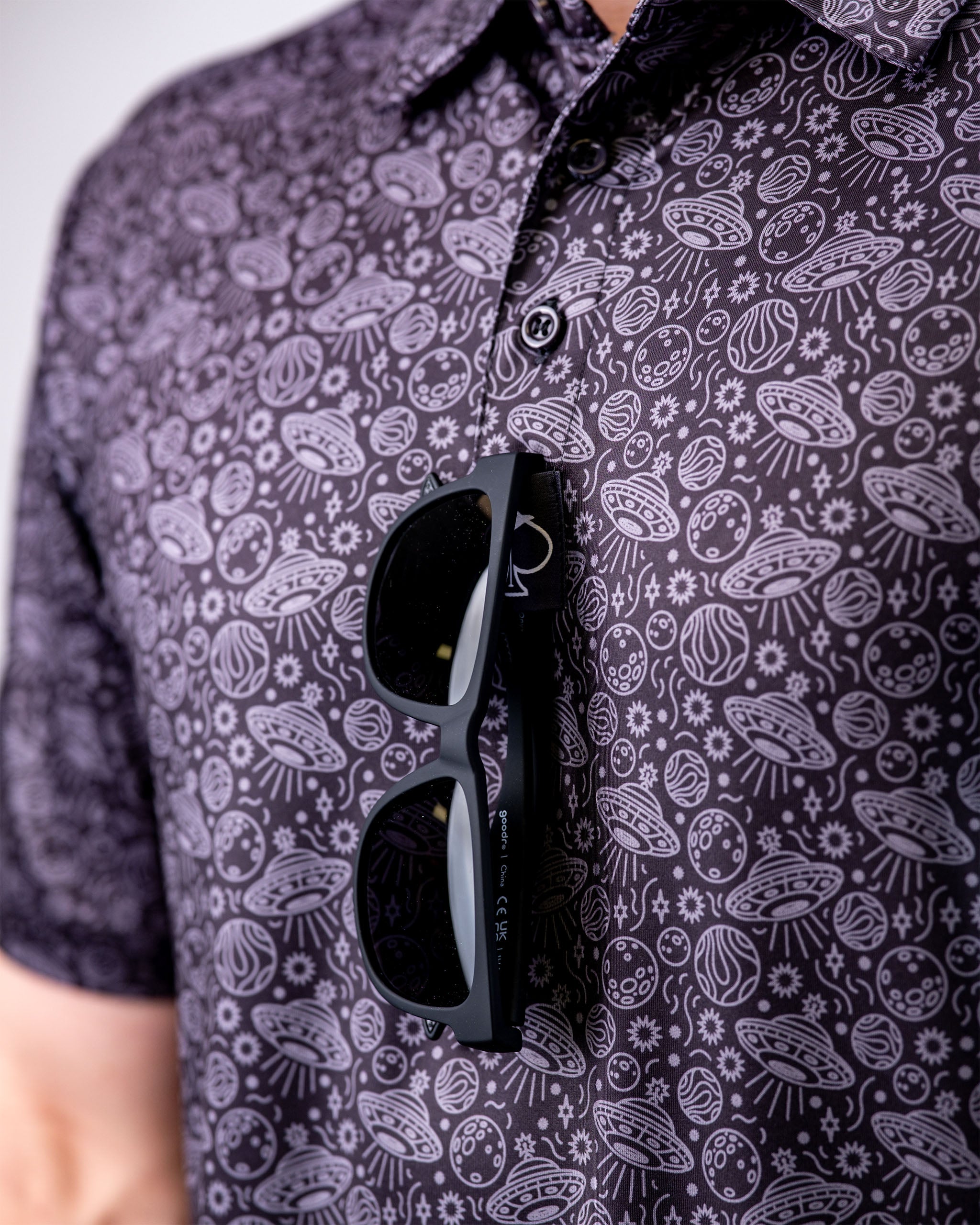 Men's black polo shirt by HEYDUDE featuring a modern design and comfortable fit, ideal for casual wear.