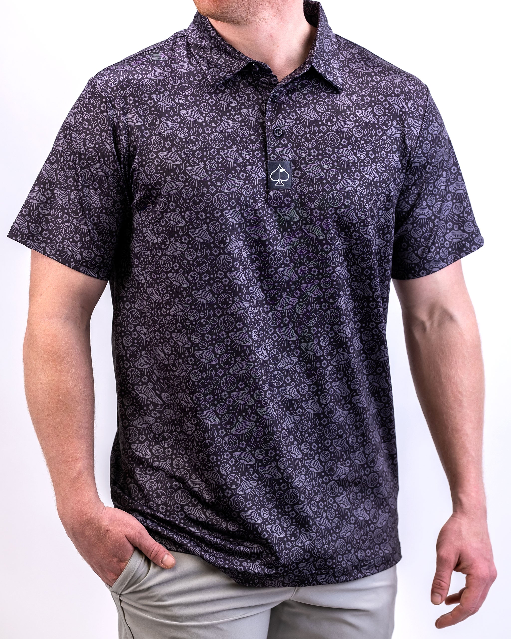 Men's HEYDUDE Polo in Black Hole design, featuring a stylish, modern cut with a unique abstract pattern.