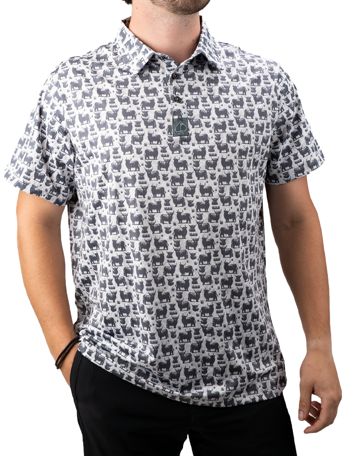 Highland Cow golf polo featuring a playful all-over print of Highland cows in black and white, perfect for a bold style on the course.