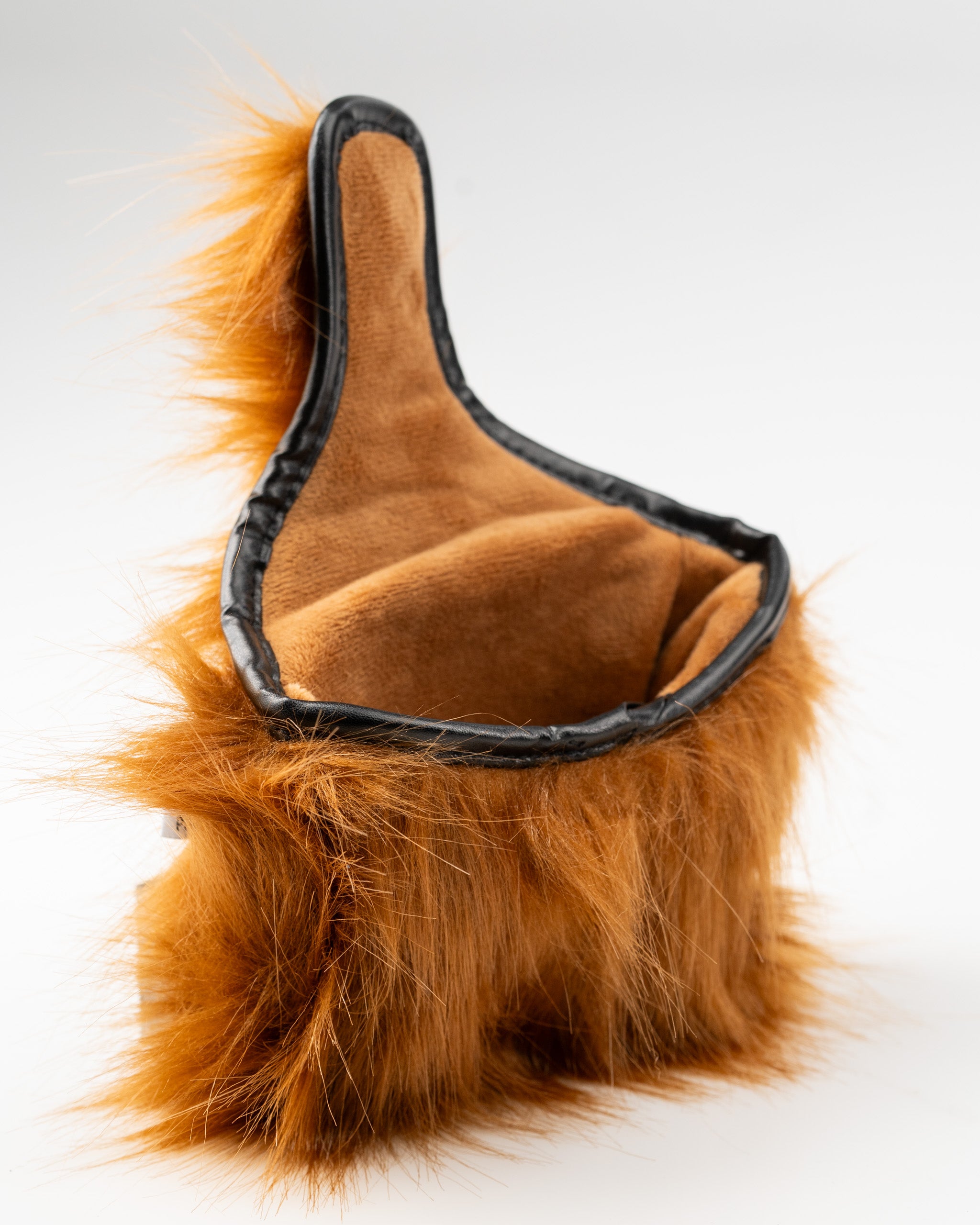 Highland cow mallet putter cover with soft faux fur exterior and plush interior for stylish golf protection.
