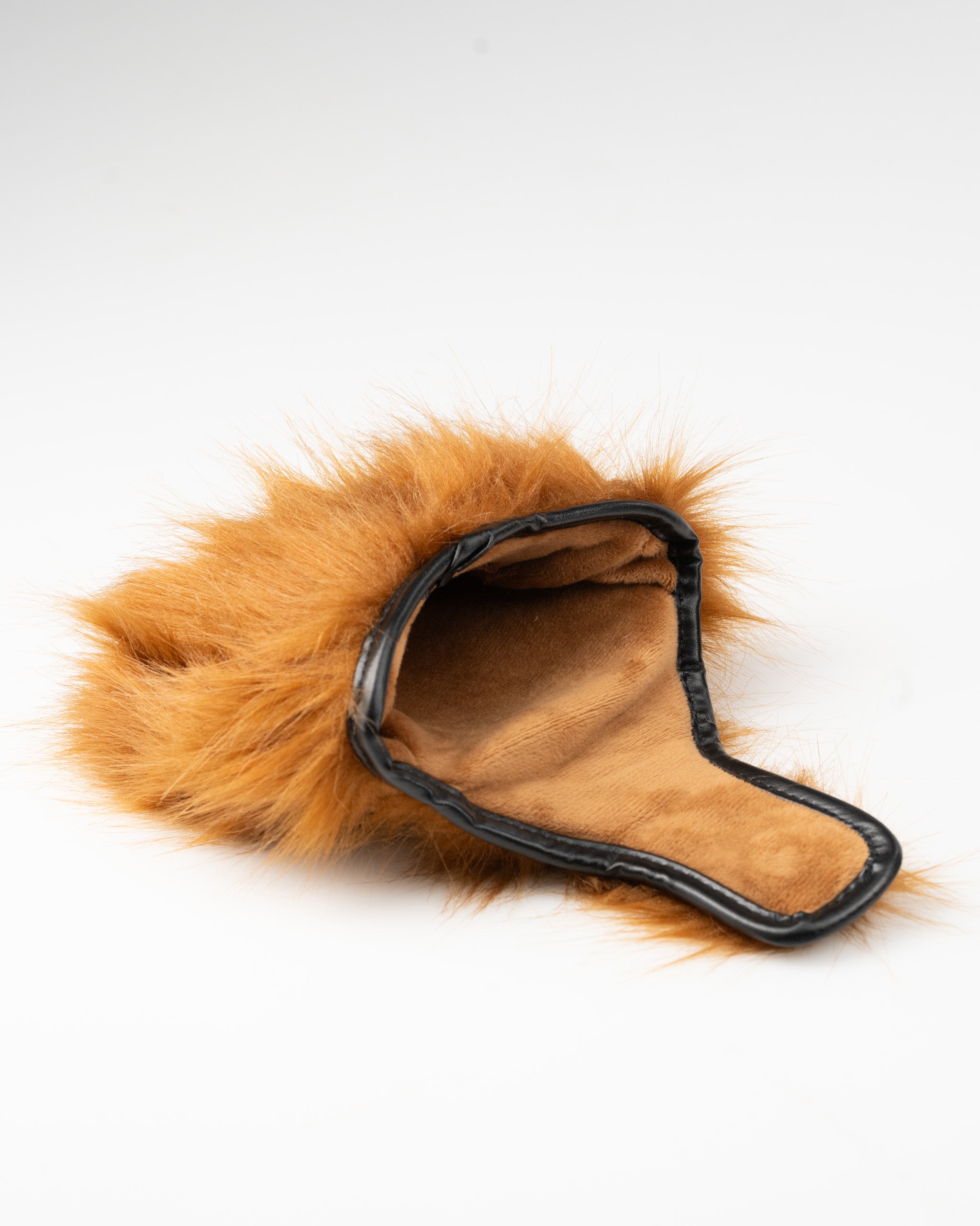 Highland cow mallet putter cover with a soft faux fur exterior and a plush interior for protection on the golf course.
