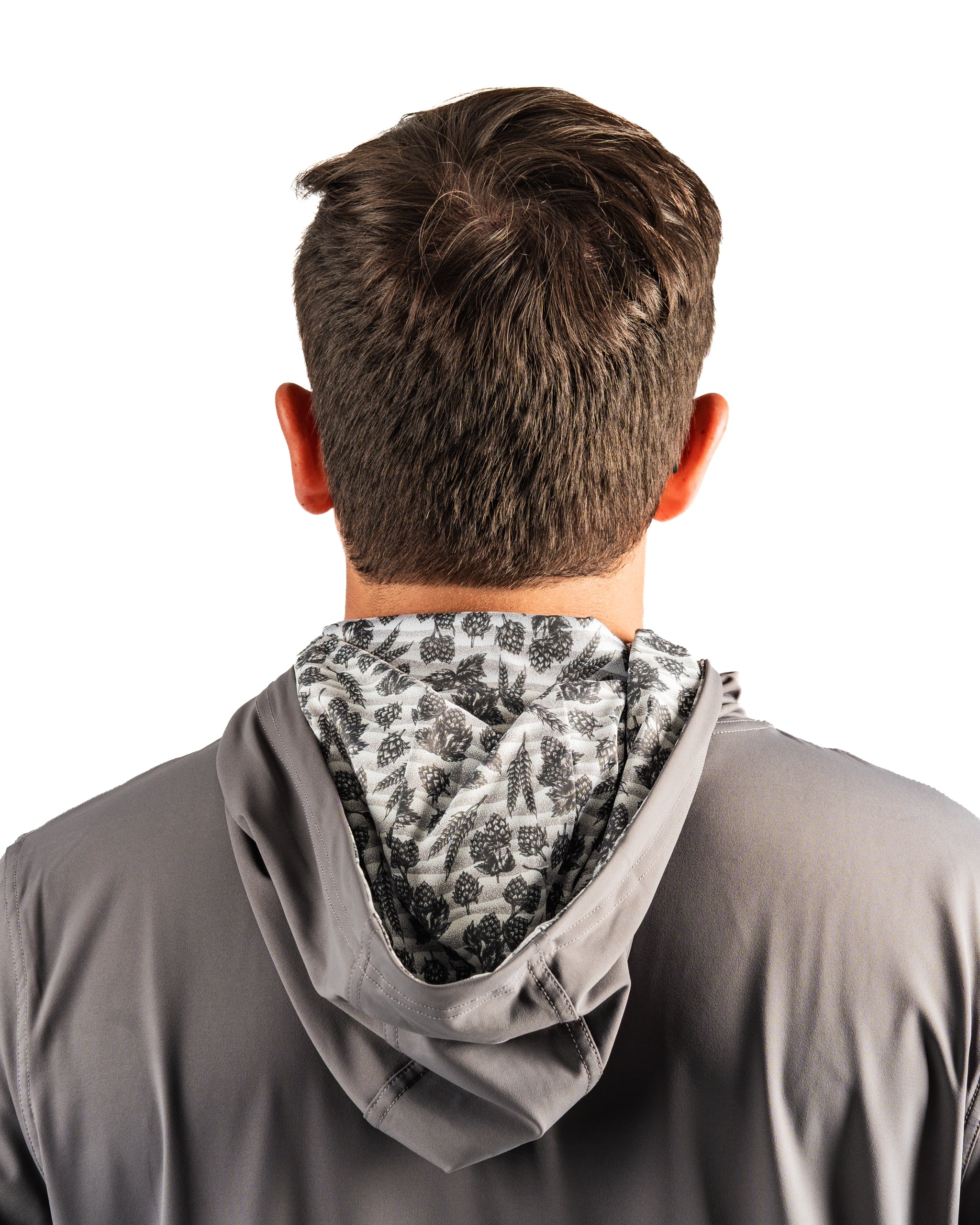 Men's performance golf hoodie in gray with a unique hops and barley patterned interior, designed for comfort on the course.
