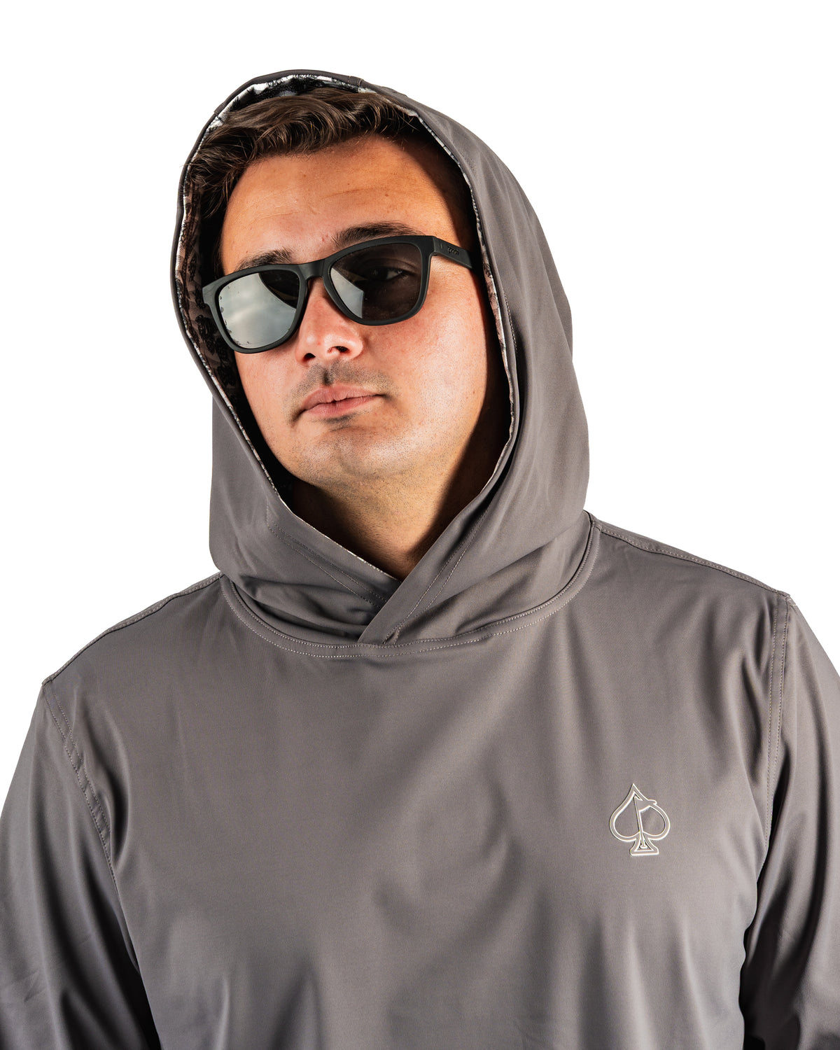Men's performance golf hoodie in gray with a stylish hood and spade logo, designed for comfort on the course.