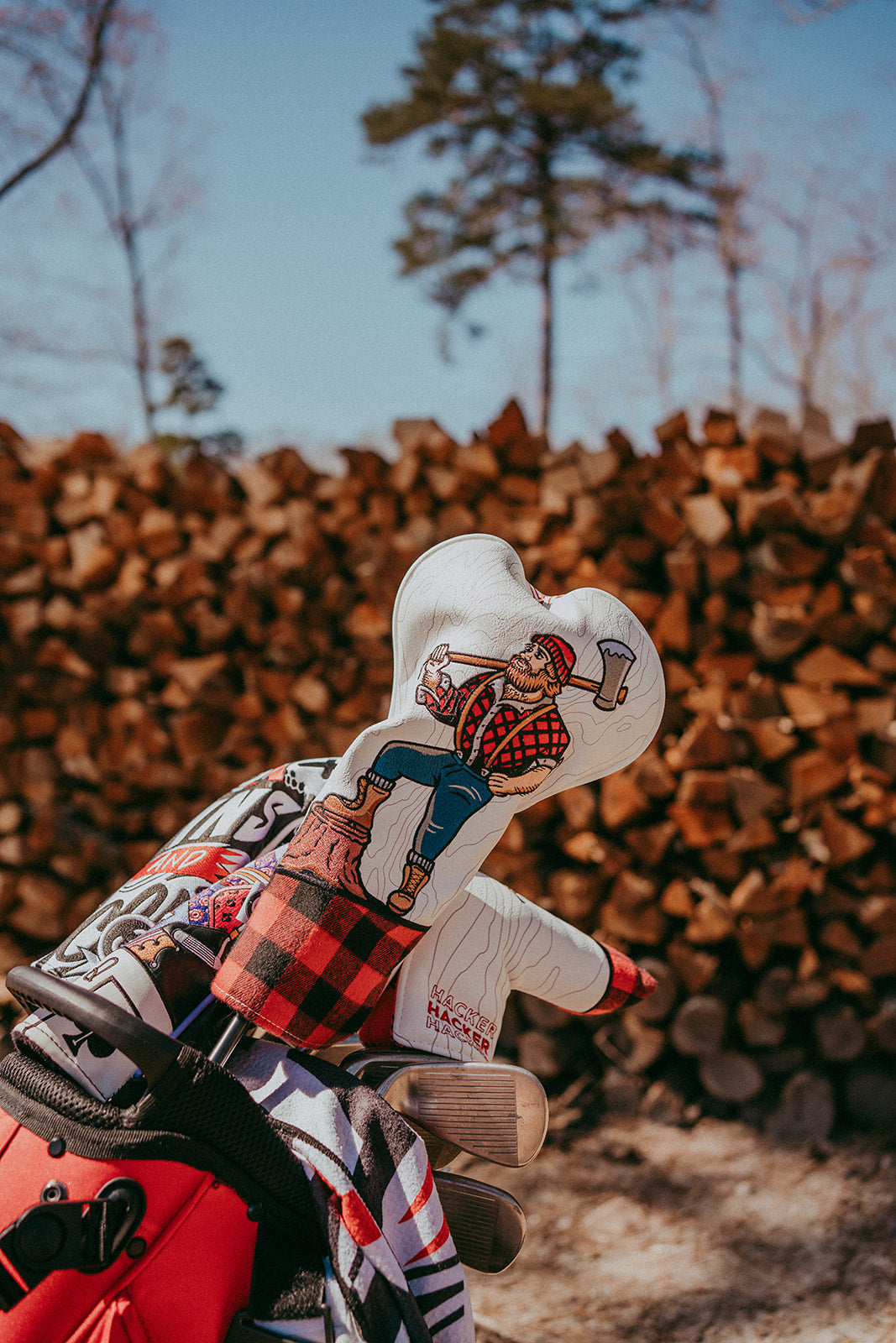 Black Hacker Driver Cover with a geometric pattern, featuring a bold "Hacker" graphic on the front.