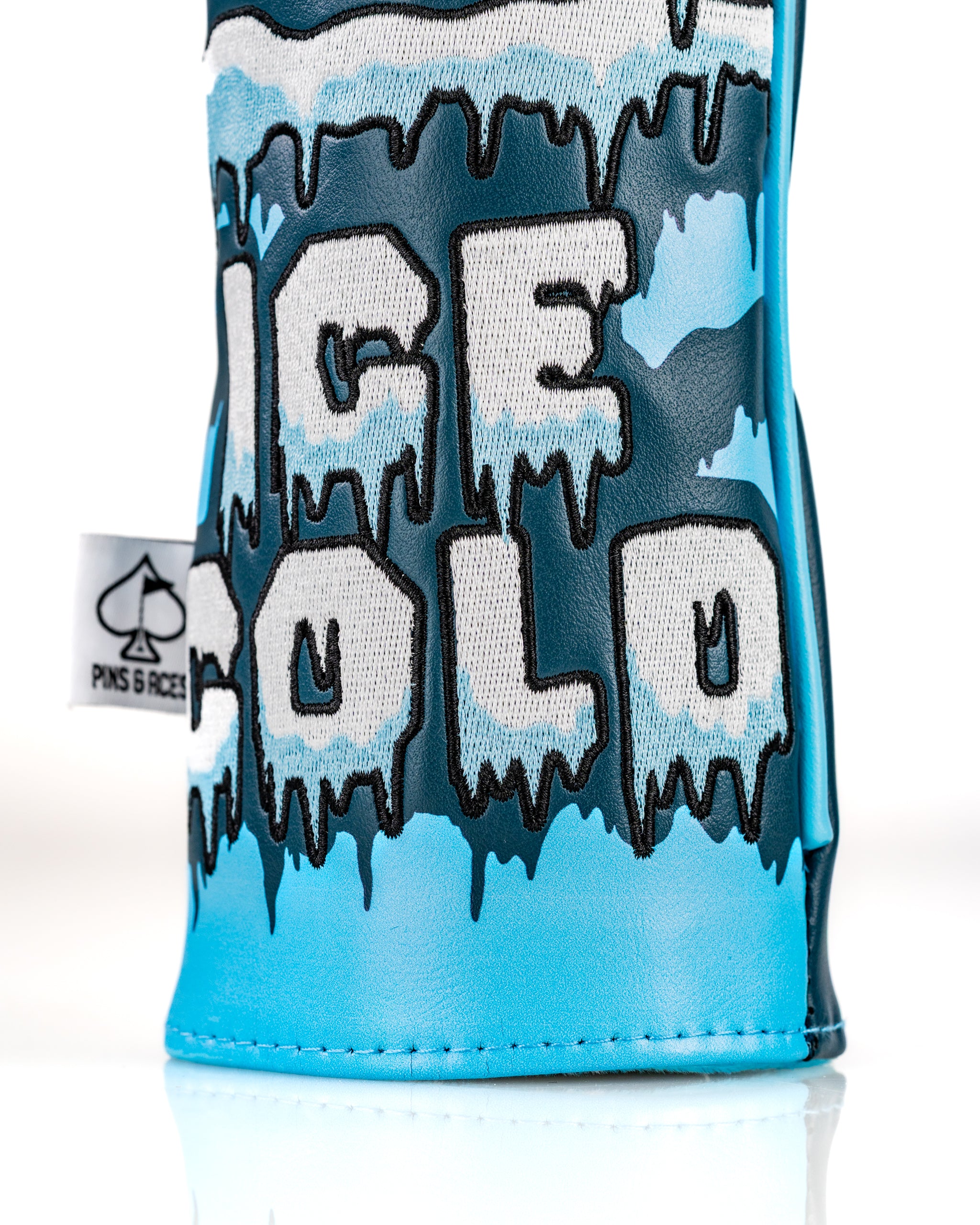Snowman Ice Cold headcover set featuring bold, icy lettering and a vibrant blue design, perfect for unique golf style.