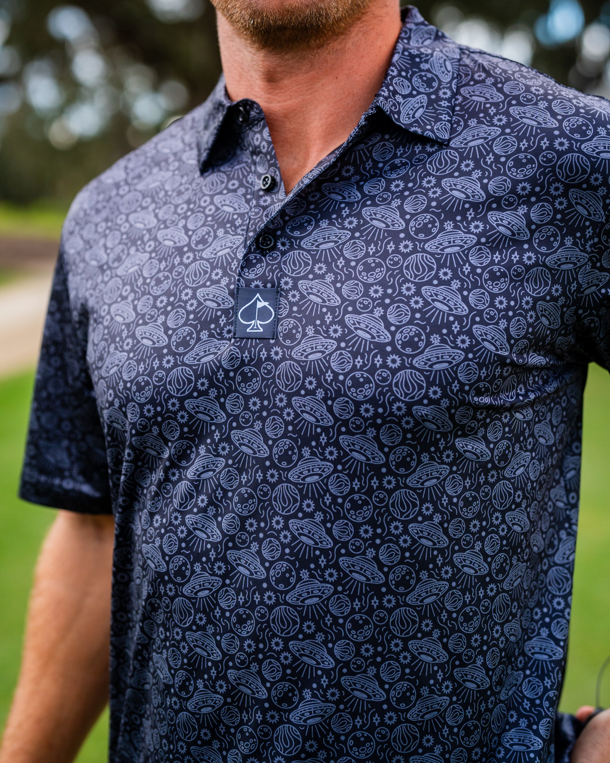 Black HEYDUDE shoe, model Black Hole, featuring a lightweight design and flexible sole, displayed against a neutral background.