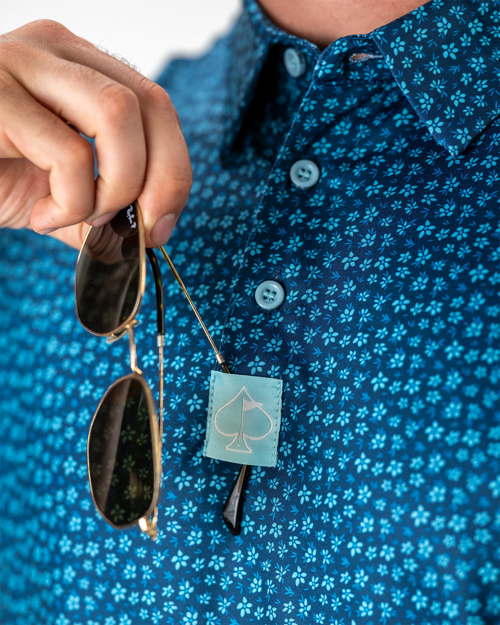 Micro Floral fabric in blue featuring delicate floral patterns, perfect for fall fashion.