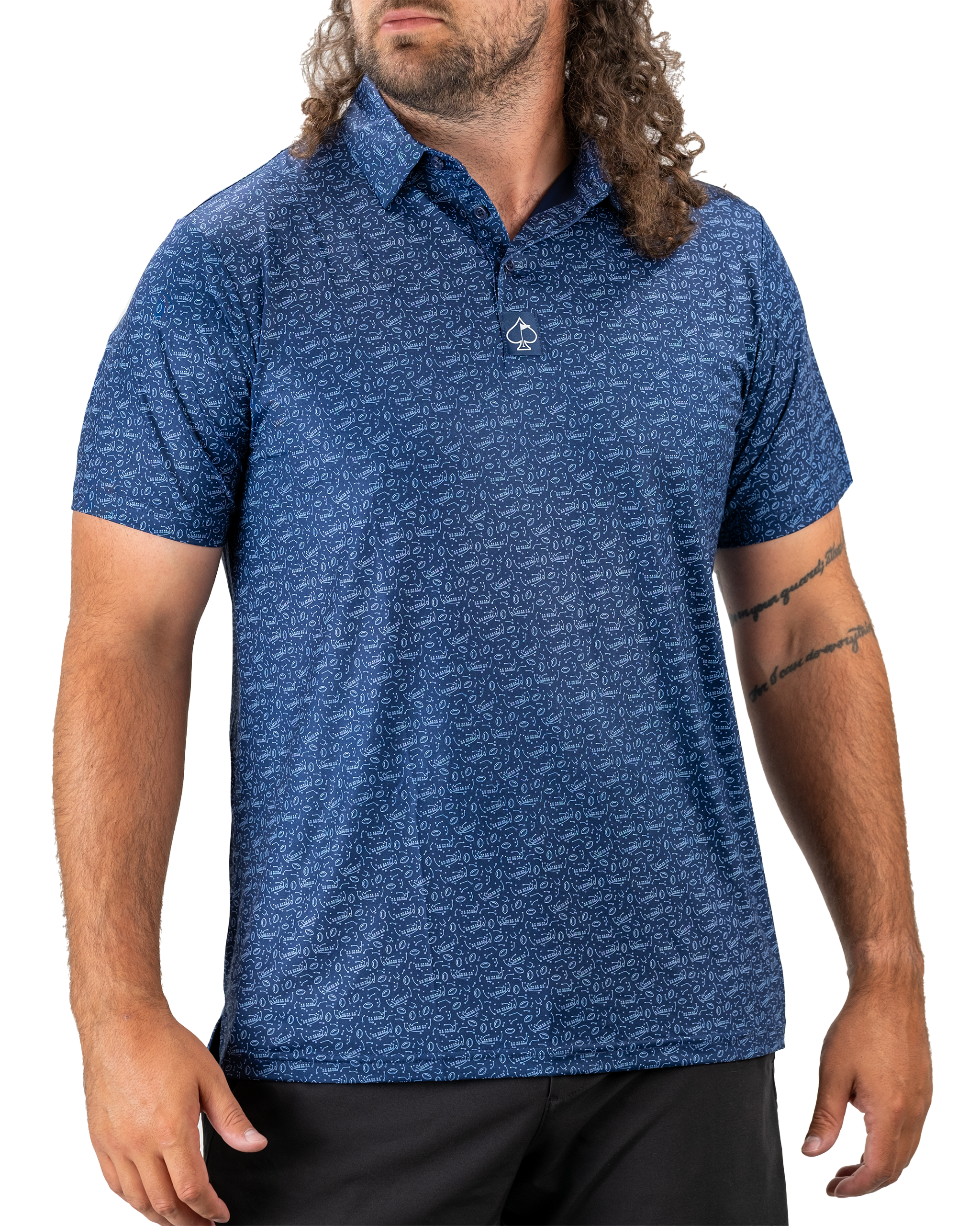 Man wearing a stylish black and white 'Playmaker' hoodie, showcasing a modern design with a graphic print on the front, set against a urban background.