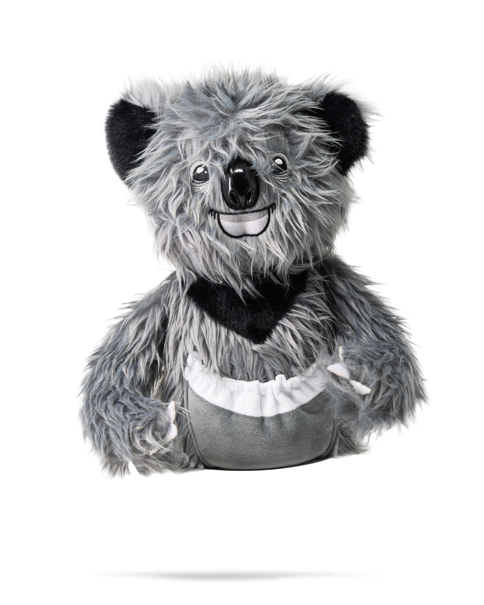 A plush koala bear driver cover with a furry gray and black design, smiling face, and a white and gray pocket on the front.