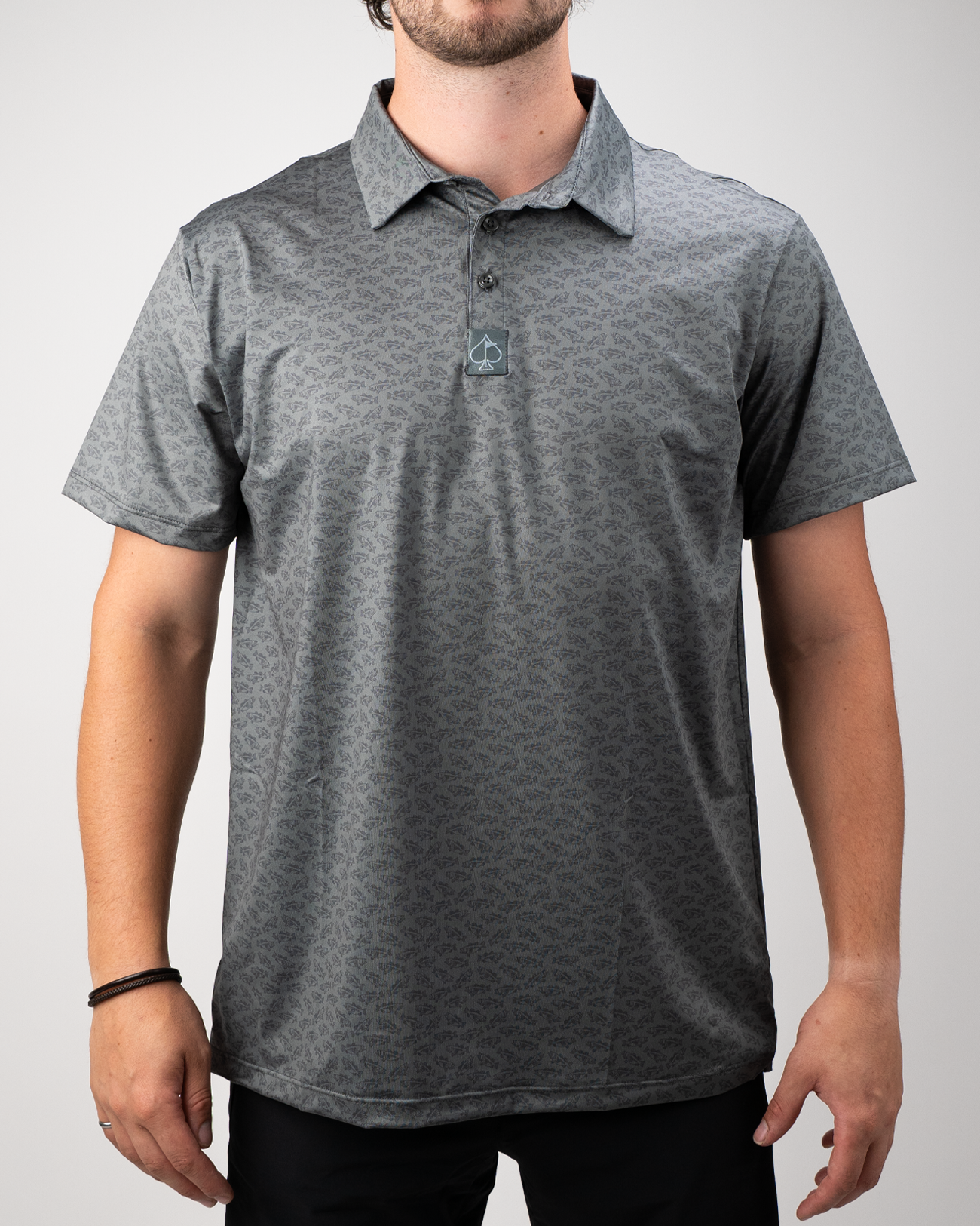 Men's Large Mouth golf polo in gray with a subtle pattern, featuring a collar and a button placket. Ideal for stylish play.