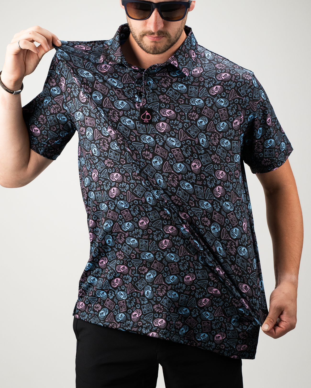 Bold golf shirt featuring a playful pattern of lip pillows in vibrant colors, perfect for making a statement on the course.