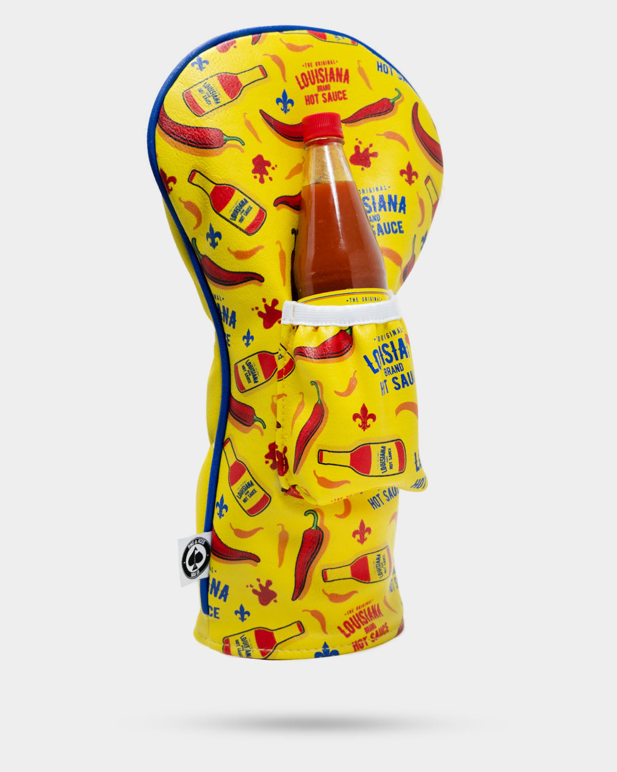 Louisiana Hot Sauce golf driver cover featuring vibrant red and yellow design with iconic branding and a snug fit.