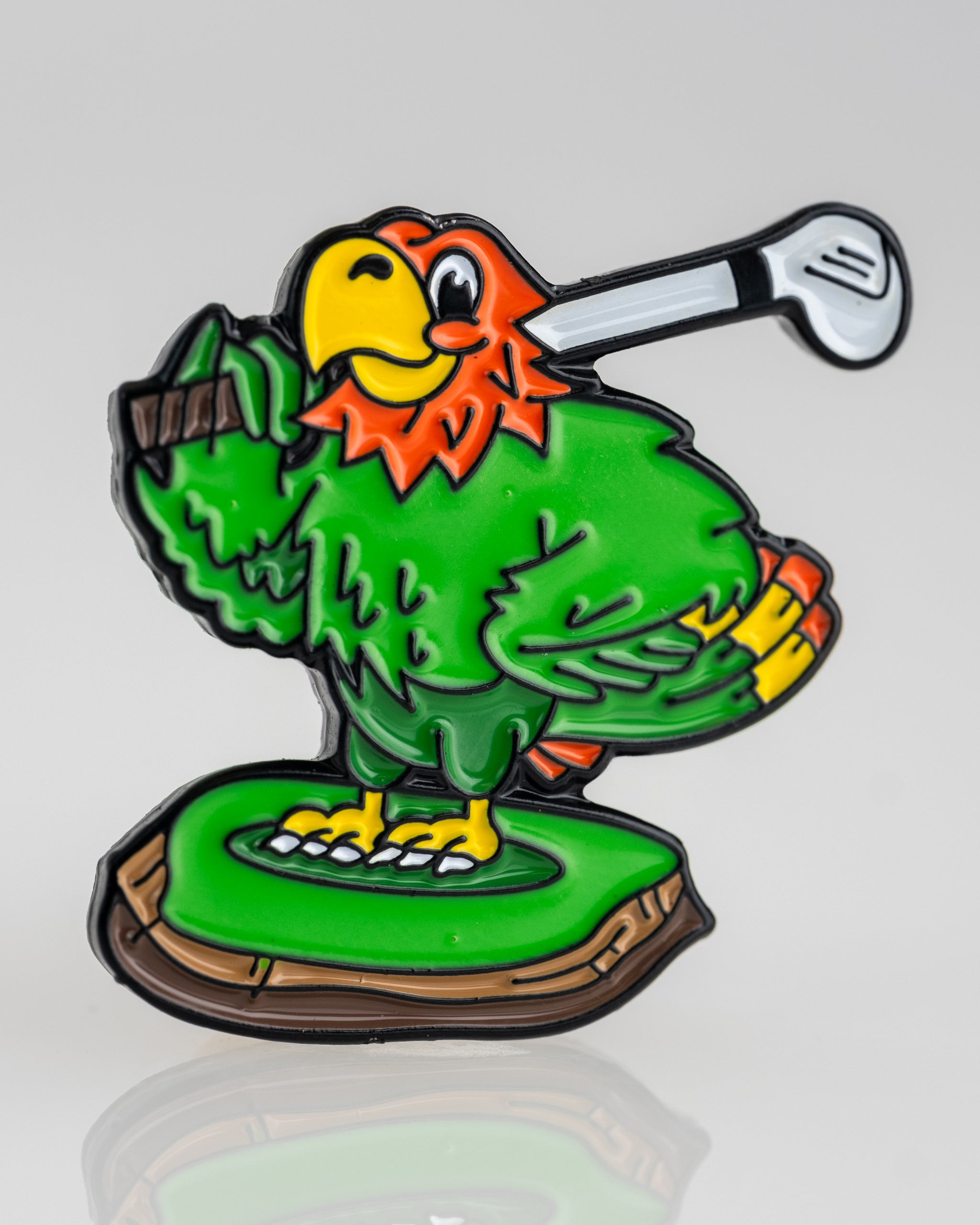 Margaritaville golfing parrot ball marker with colorful design and detailed parrot illustration.