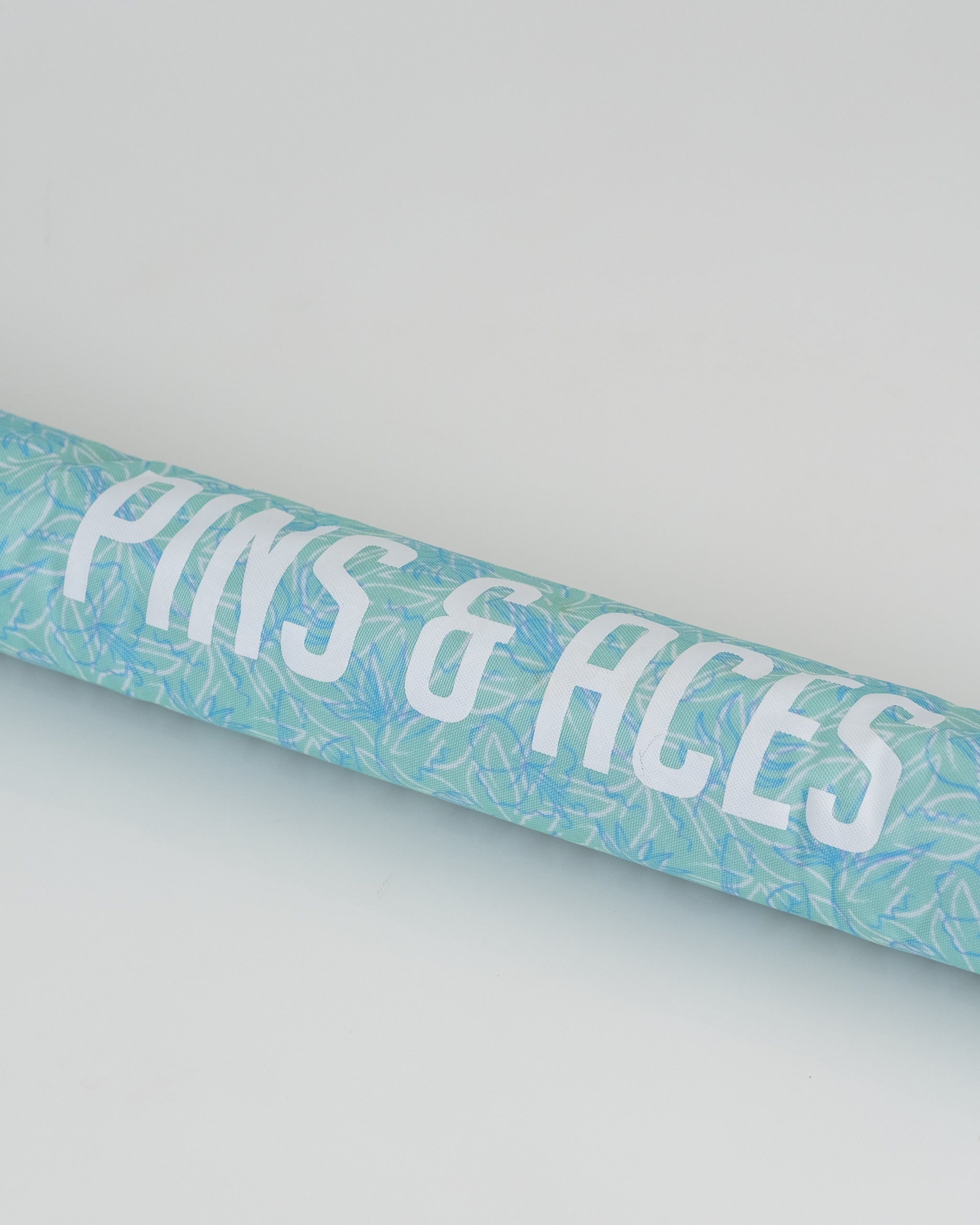 Margaritaville beer sleeve featuring a vibrant tropical design, ideal for keeping beverages cold.