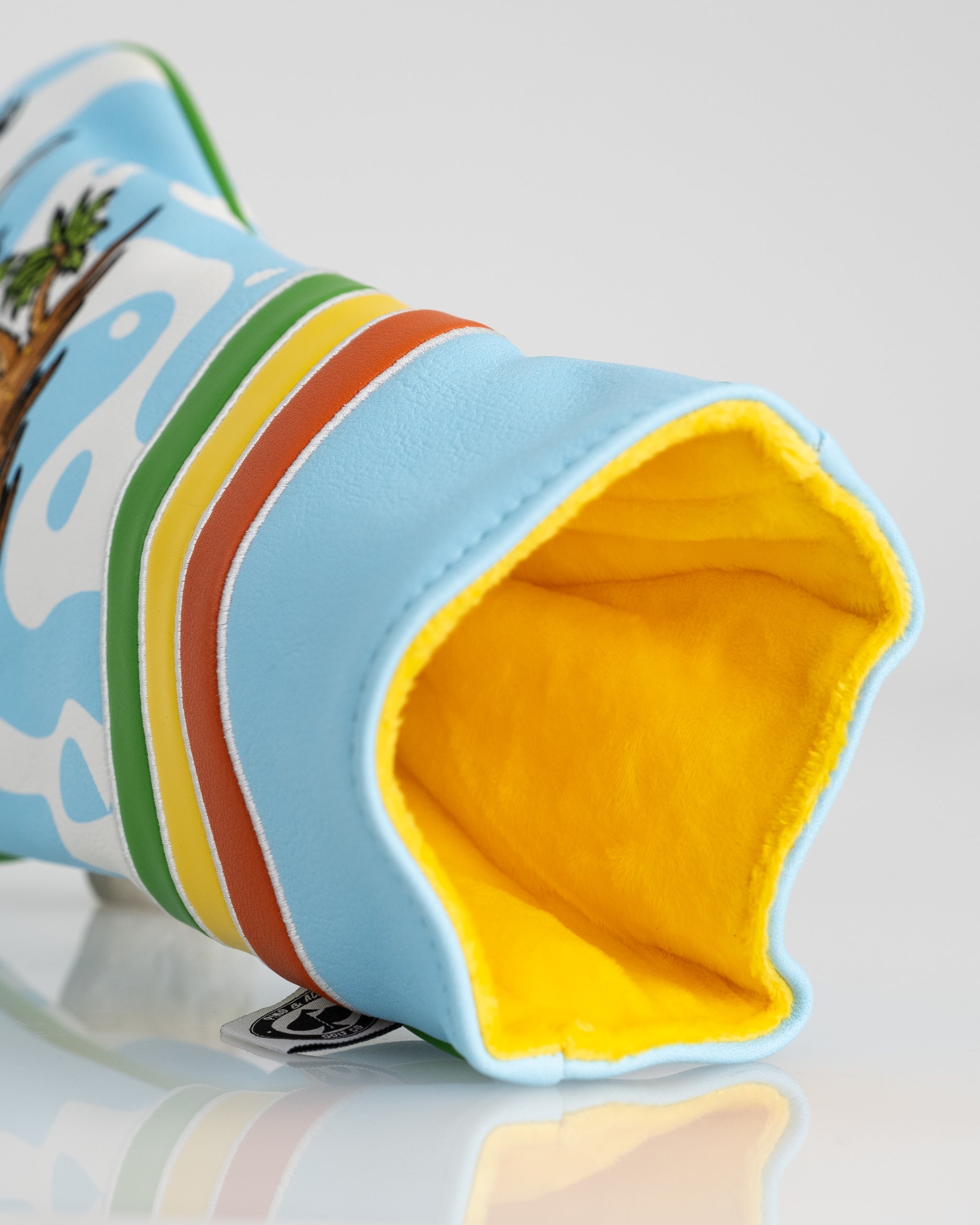 Margaritaville driver cover featuring vibrant tropical designs and a fun pineapple motif, ideal for golf enthusiasts.