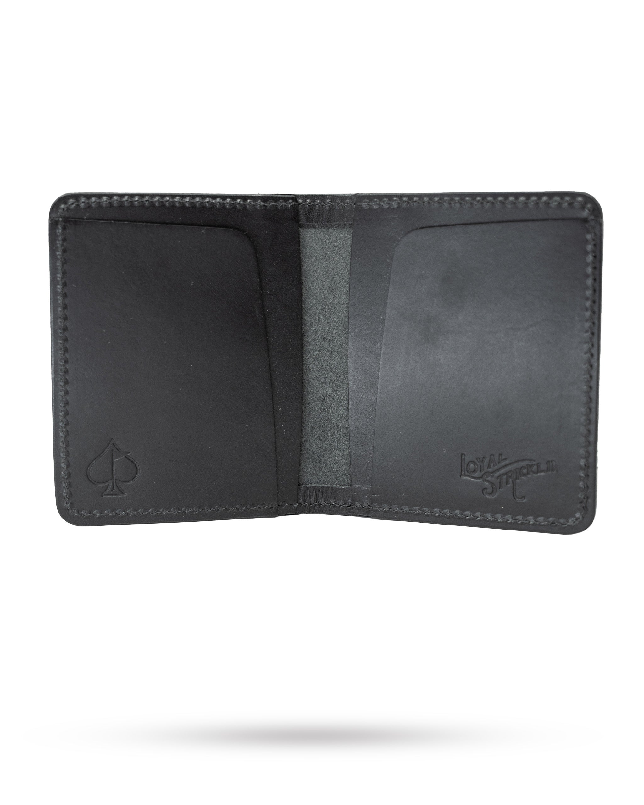 Miles Wallet in smooth Italian black leather, showcasing a minimalist design with sleek edges and a compact silhouette.