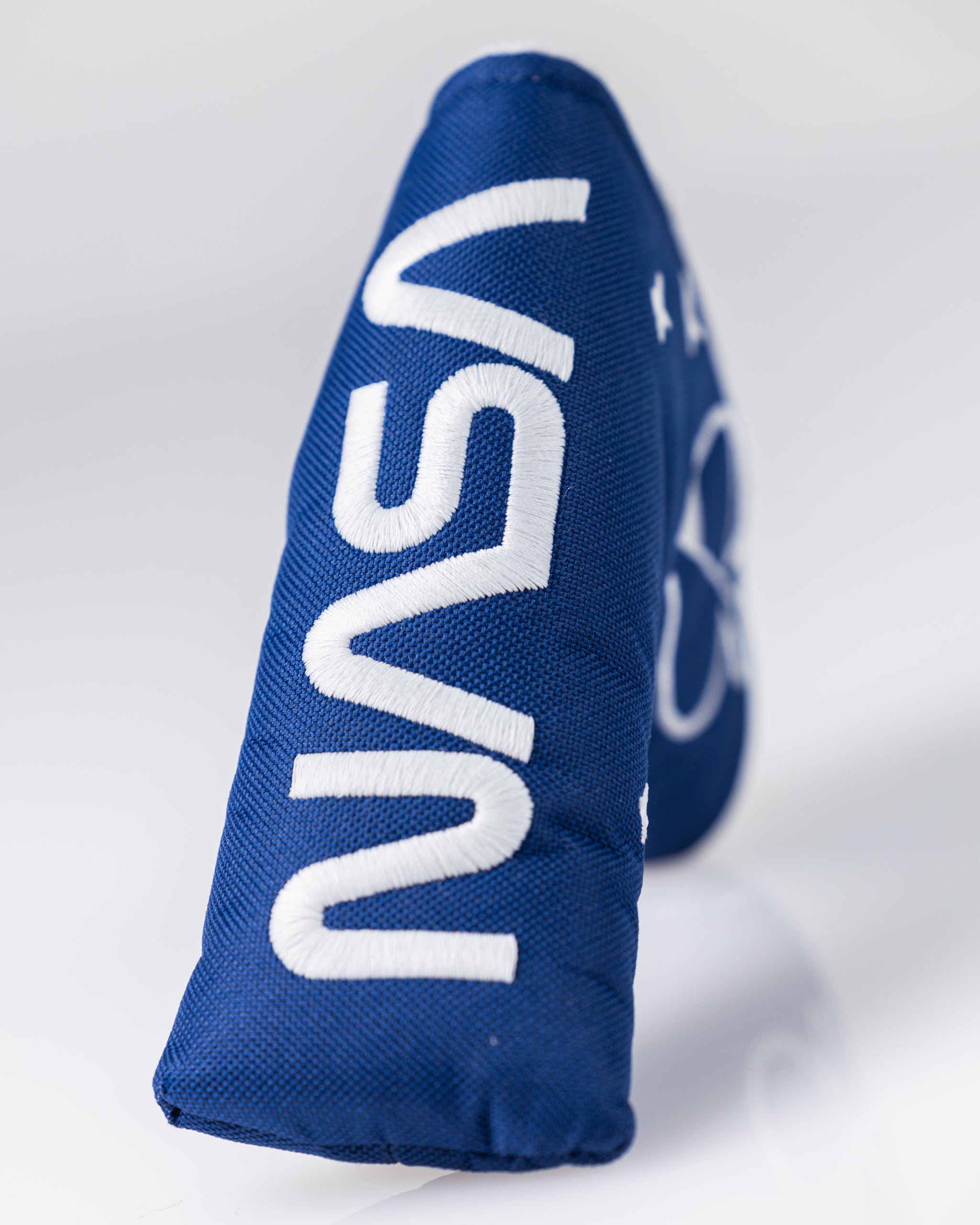 NASA Space Walk Blade Putter Cover featuring a cosmic design with vibrant colors and NASA logo.