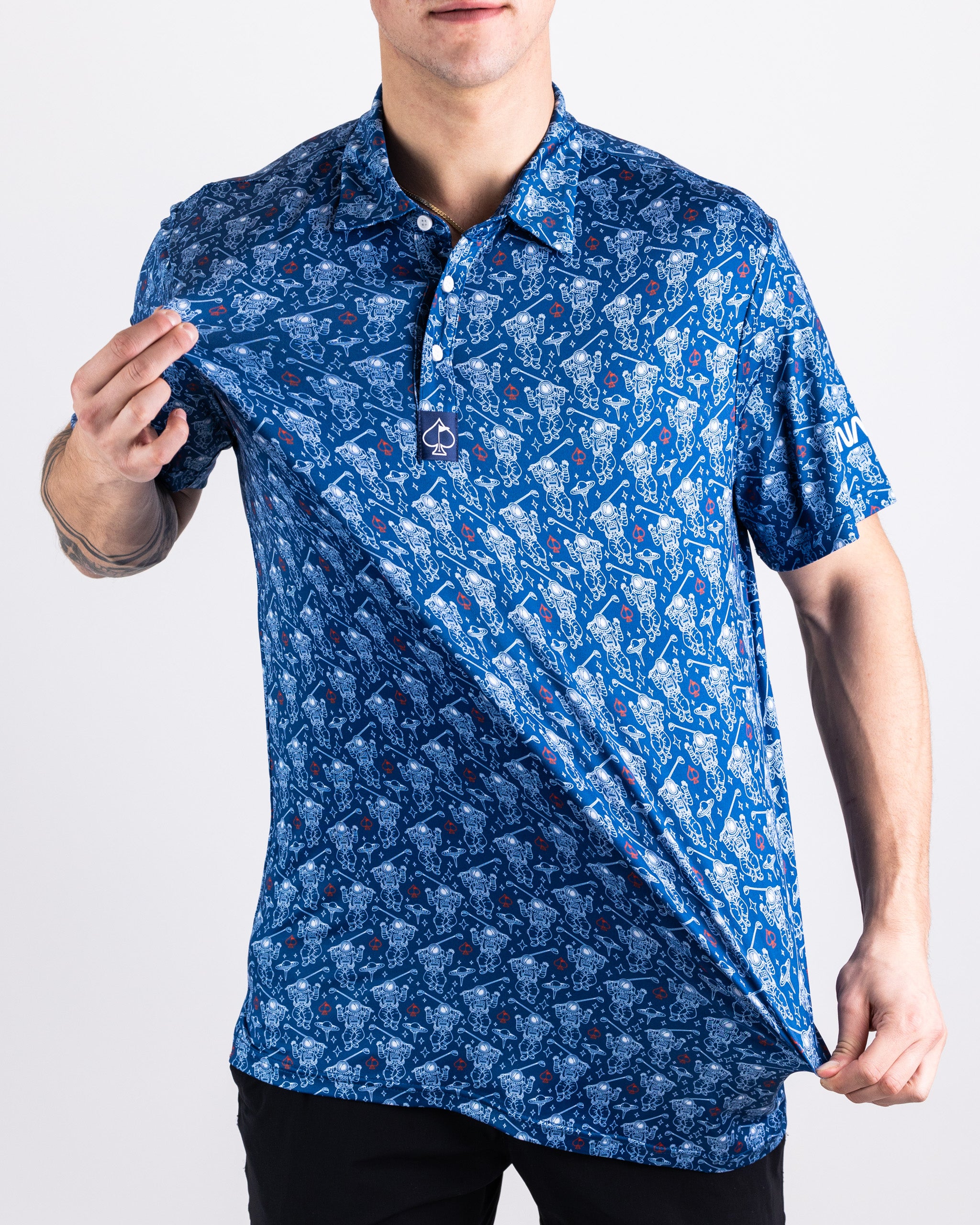 Blue NASA Space Walker polo shirt featuring the iconic NASA logo and an astronaut graphic on the chest.