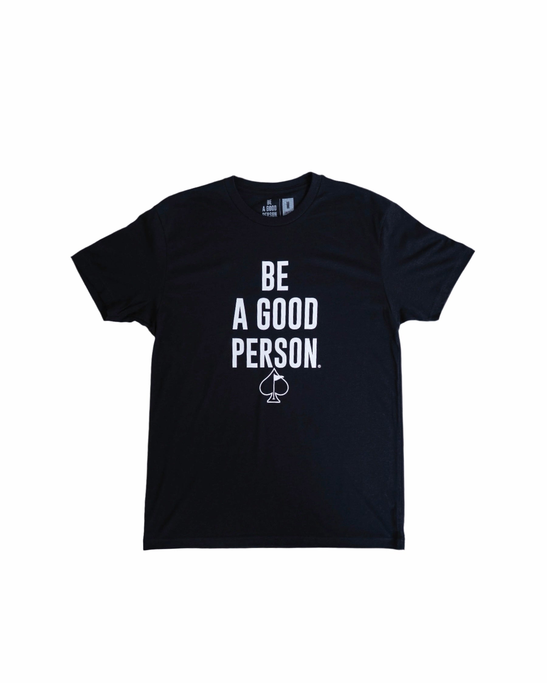 Black t-shirt featuring the phrase "BE A GOOD PERSON" in bold white letters, designed by Pins and Aces.