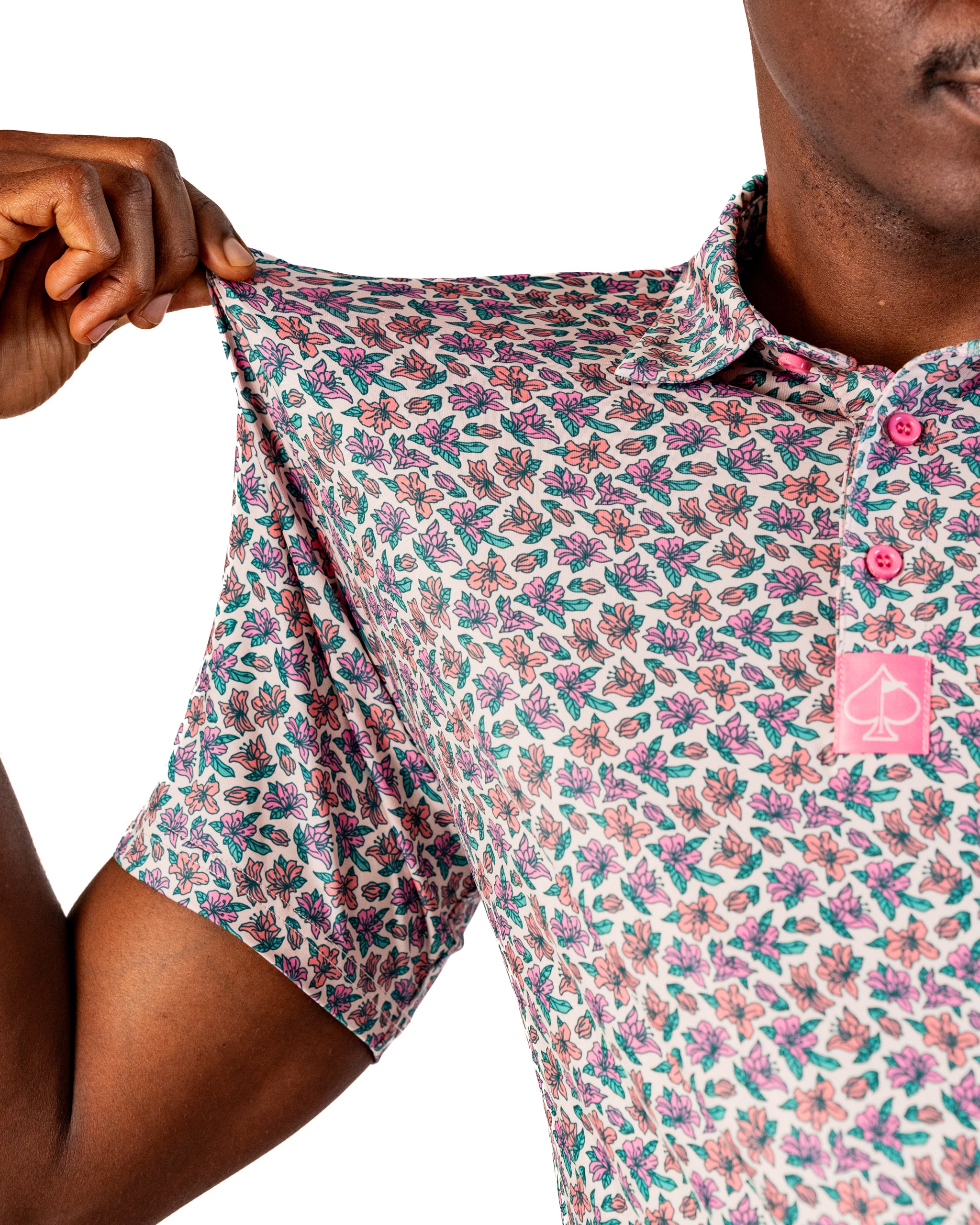 Men's Light Azalea golf polo featuring a vibrant floral pattern and a stylish collar, perfect for a bold look on the course.