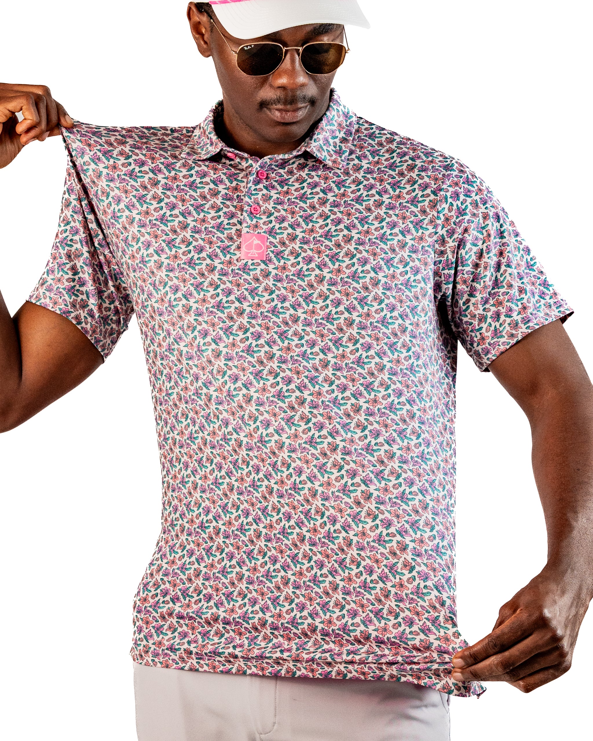 Light Azalea golf polo featuring a vibrant floral pattern, designed for stylish performance on the course.