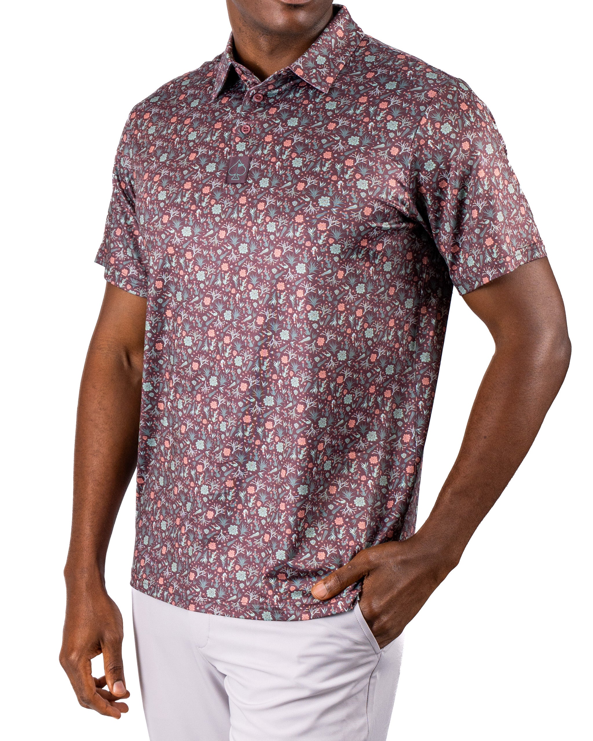 Men's Desert Sage golf shirt featuring a vibrant floral pattern, perfect for stylish performance on the course.