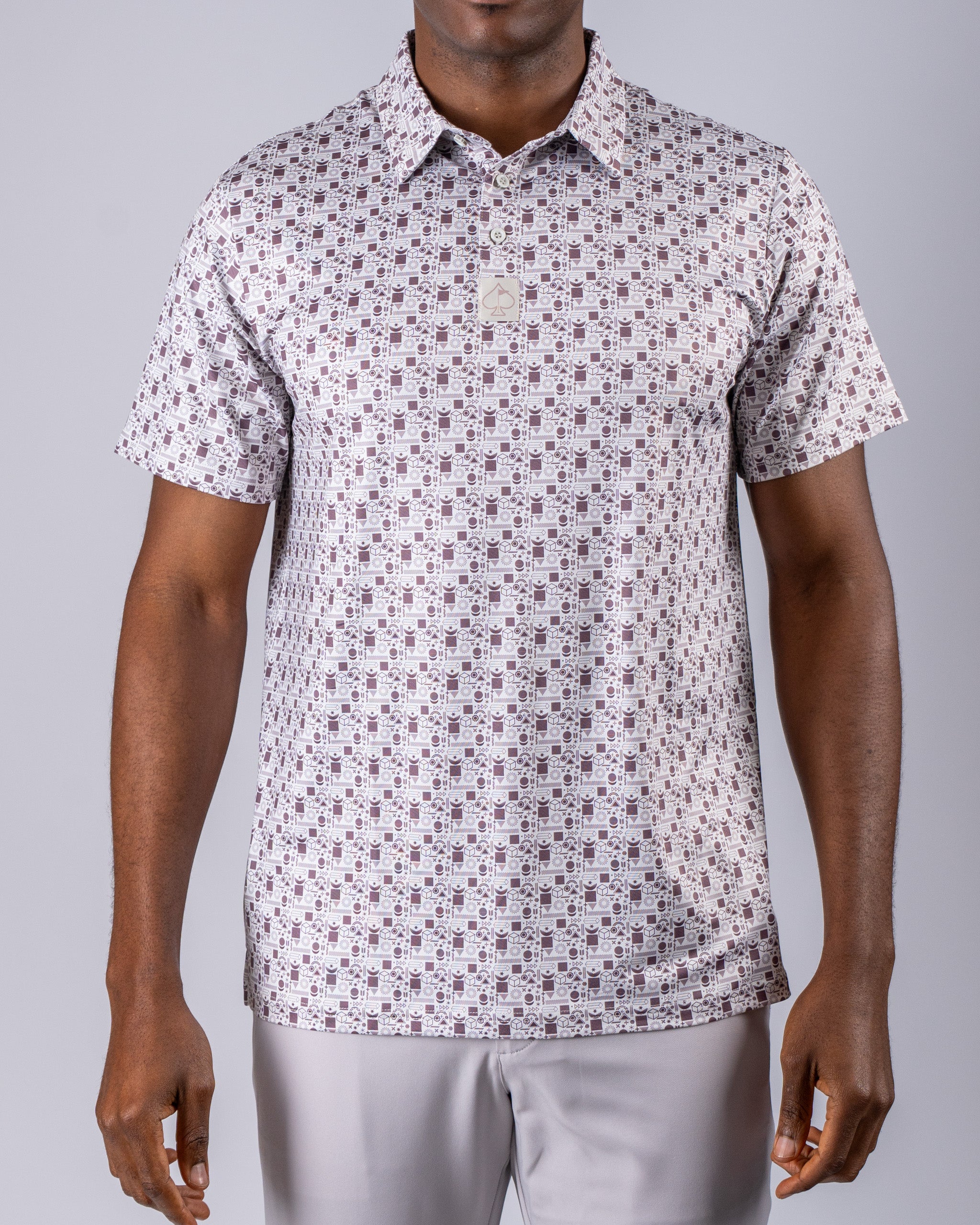 Men's retro-style golf shirt featuring a unique geometric pattern, perfect for a bold look on the course.