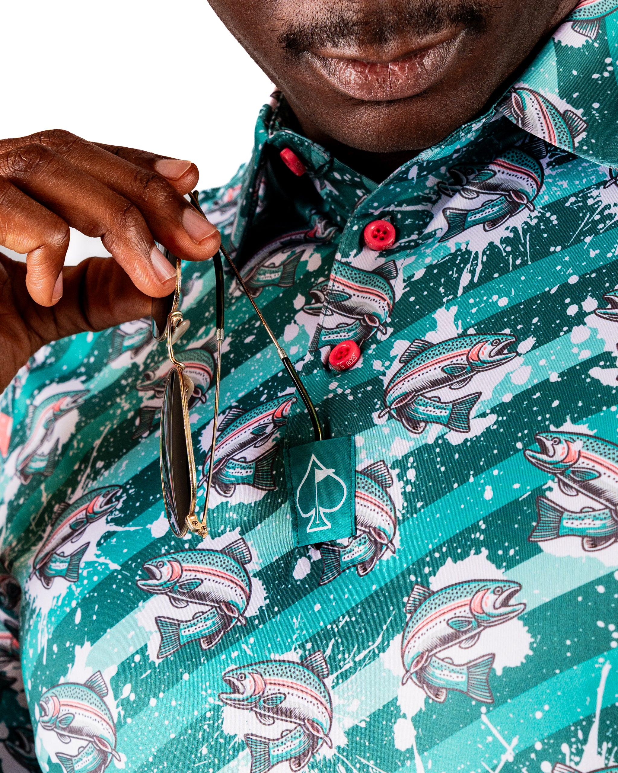 Bold golf shirt featuring a vibrant trout splatter design, perfect for stylish golfers looking to stand out on the course.