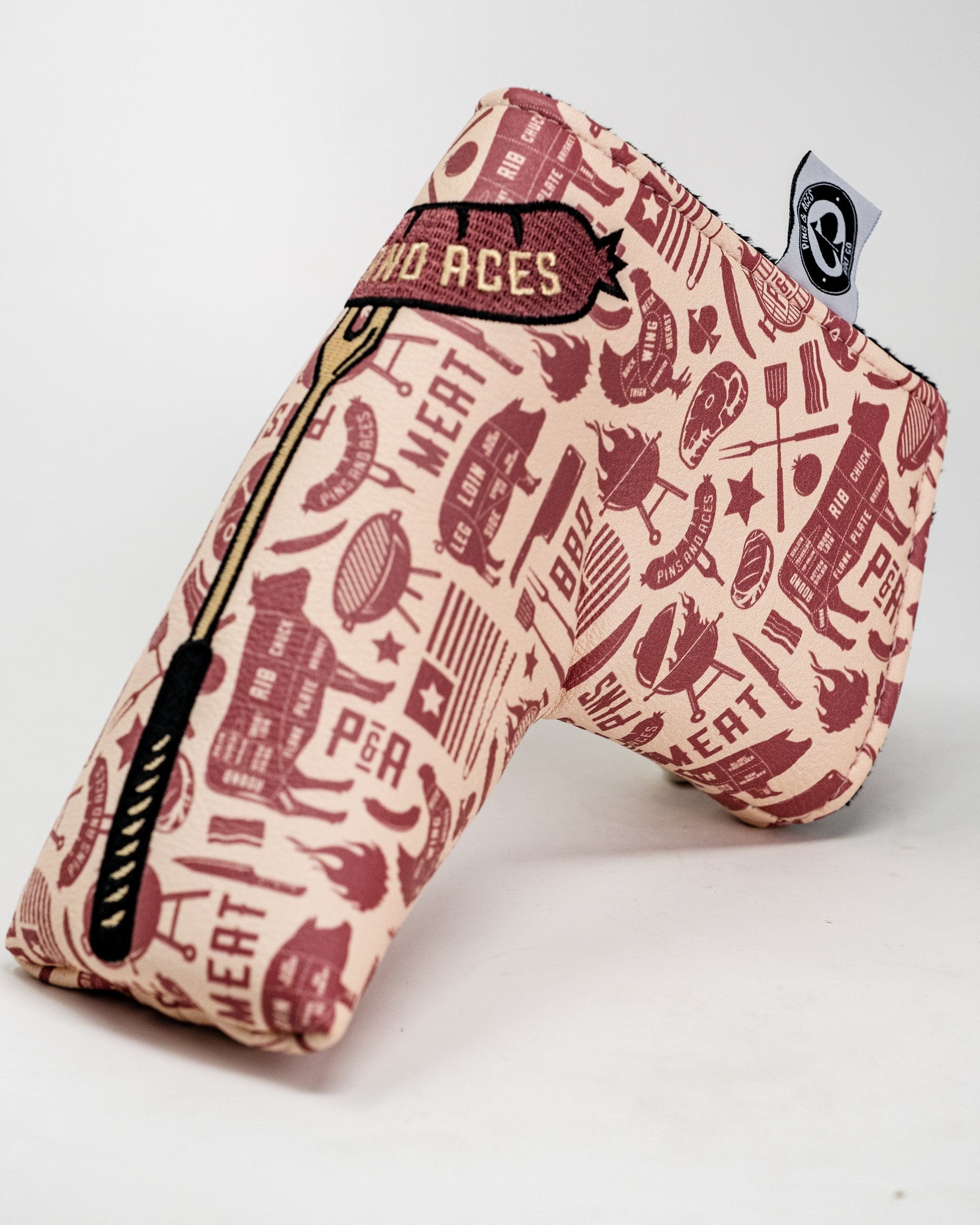 BBQ Links Blade Putter Cover featuring a colorful barbecue graphic and protective design.