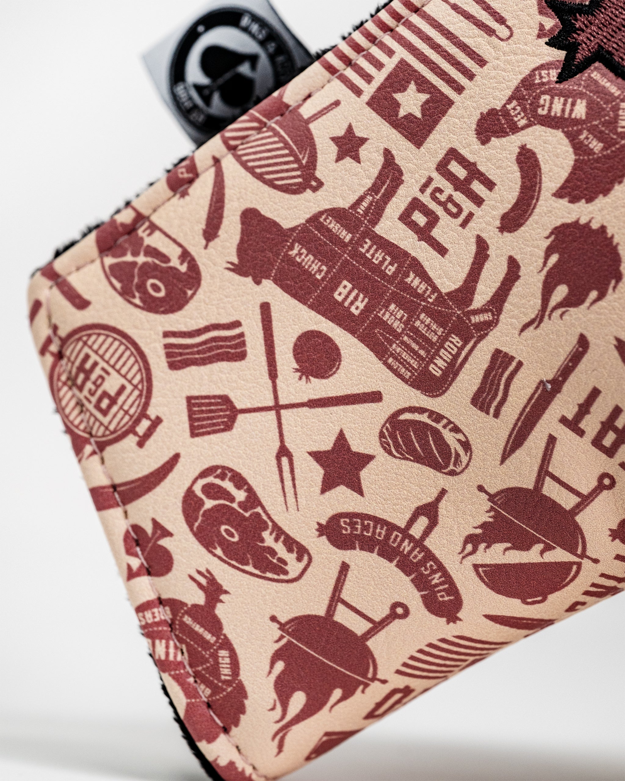 BBQ Links Blade Putter Cover with a vibrant barbecue design and protective elements.