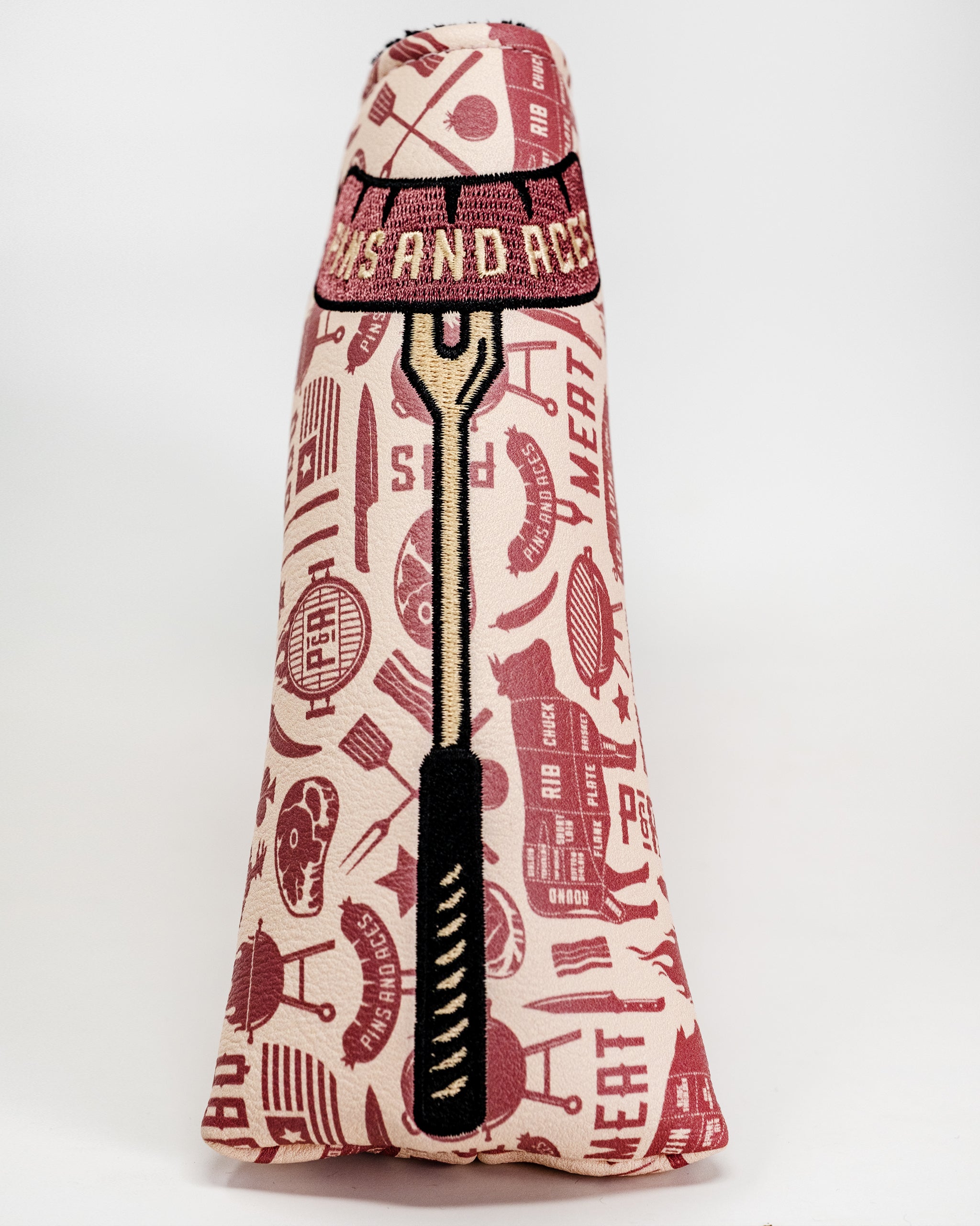 BBQ Links Blade Putter Cover featuring a vibrant barbecue-themed design and padded protection for golf putters.