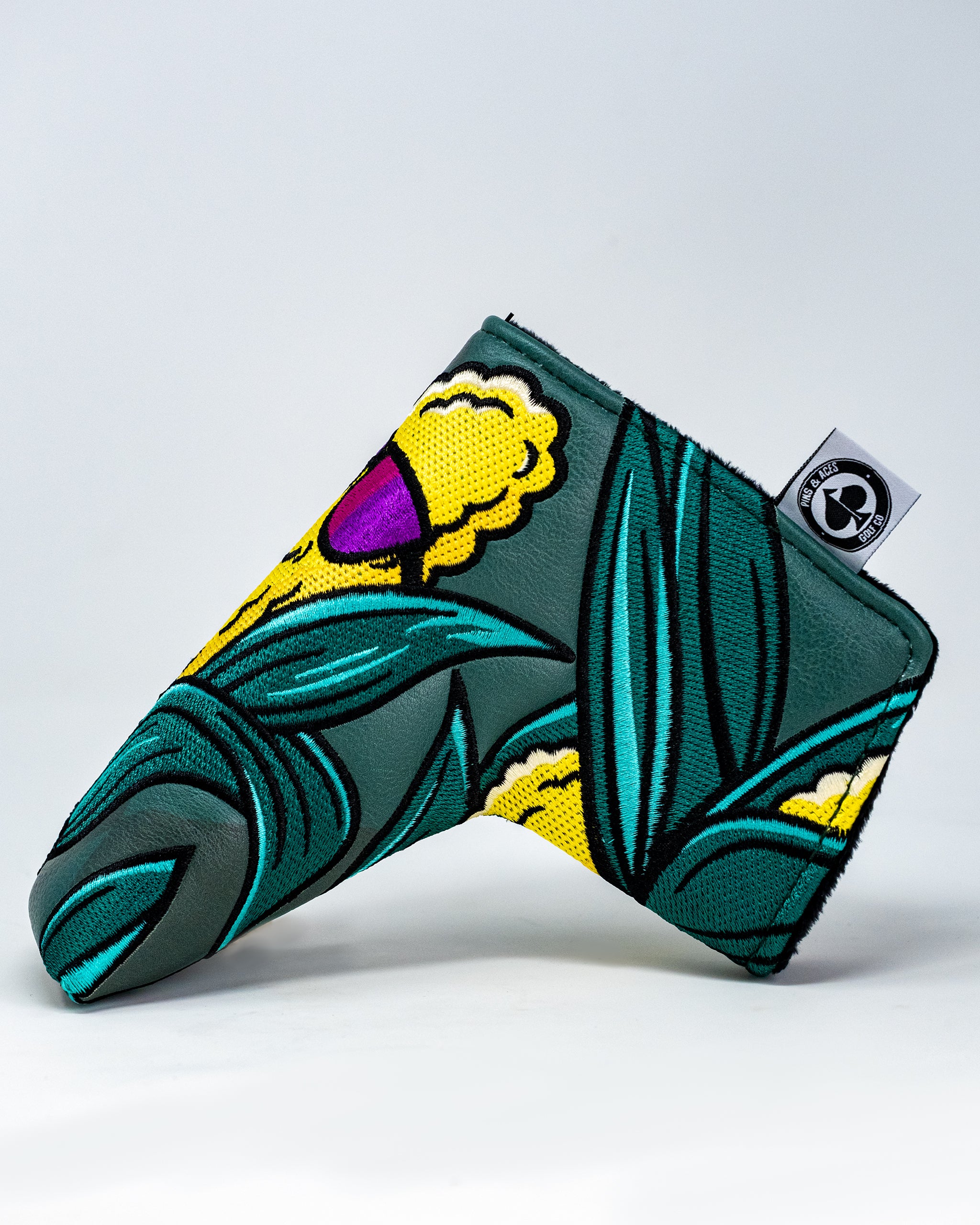 Colorful Corn Star Blade Putter Cover featuring a playful corn design, perfect for protecting golf putters.