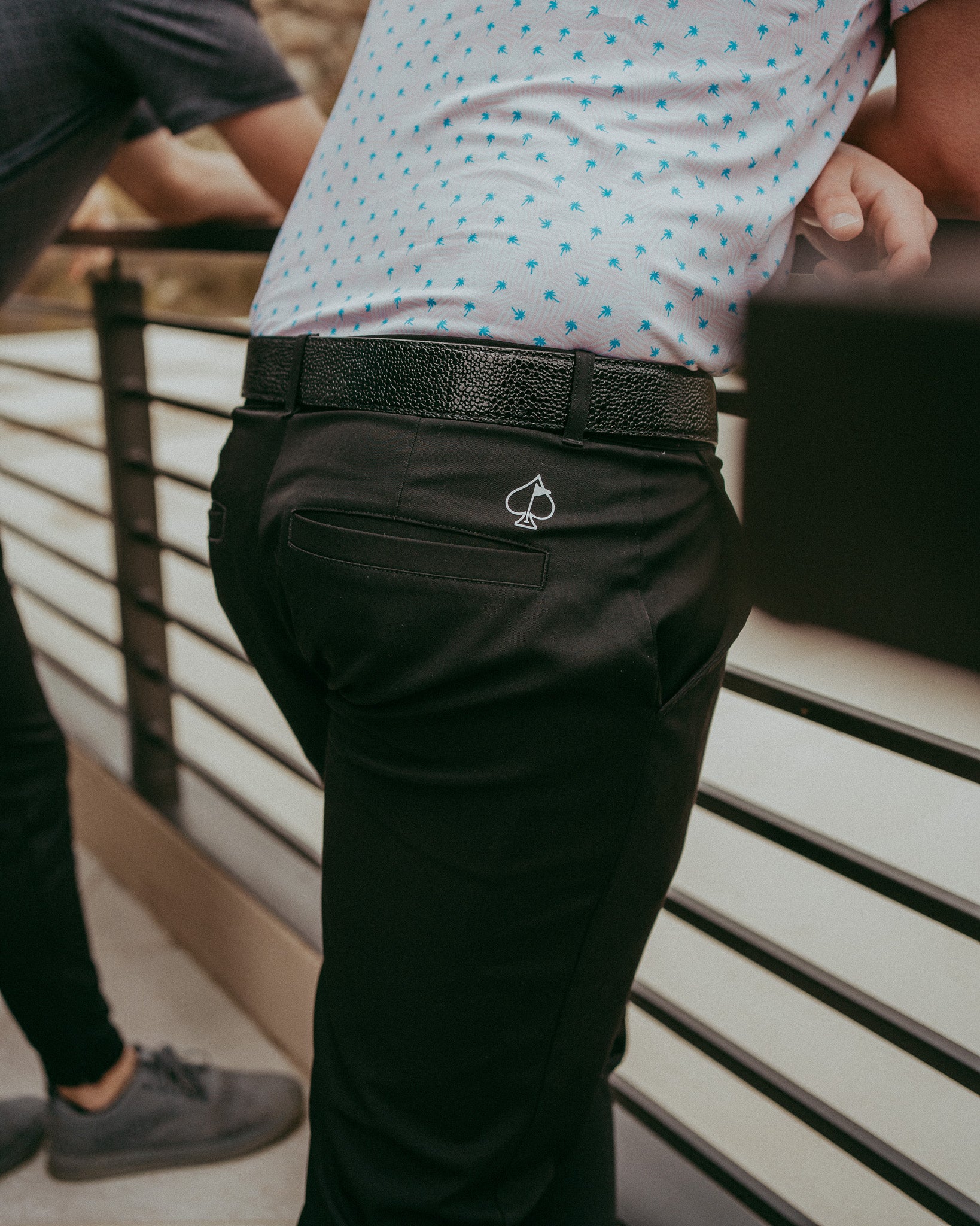 Men's black performance joggers featuring a slim fit and elastic waistband, designed for comfort and versatility in activewear.