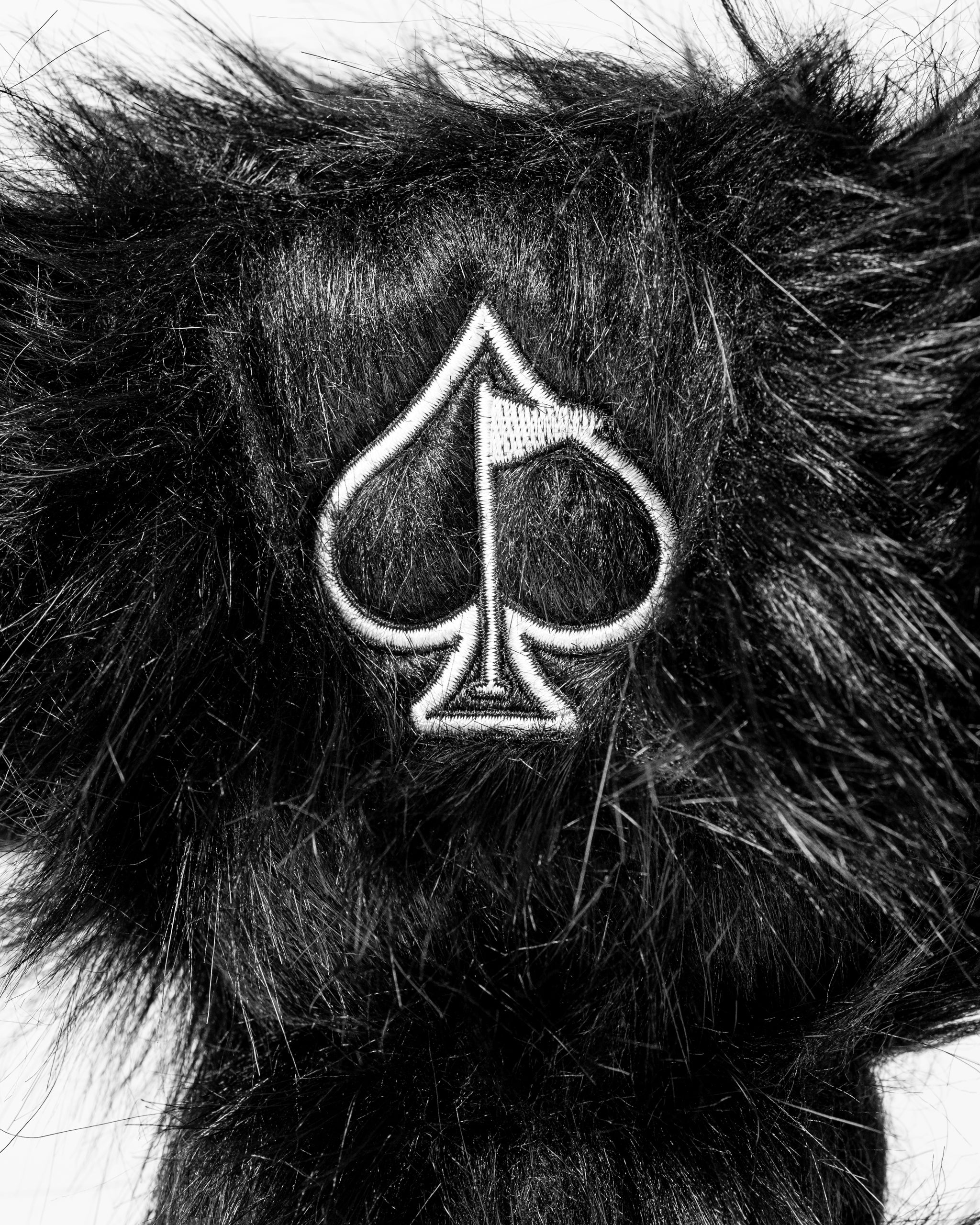 Panda headcover set featuring a plush design with a spade logo, perfect for adding style to your golf game.