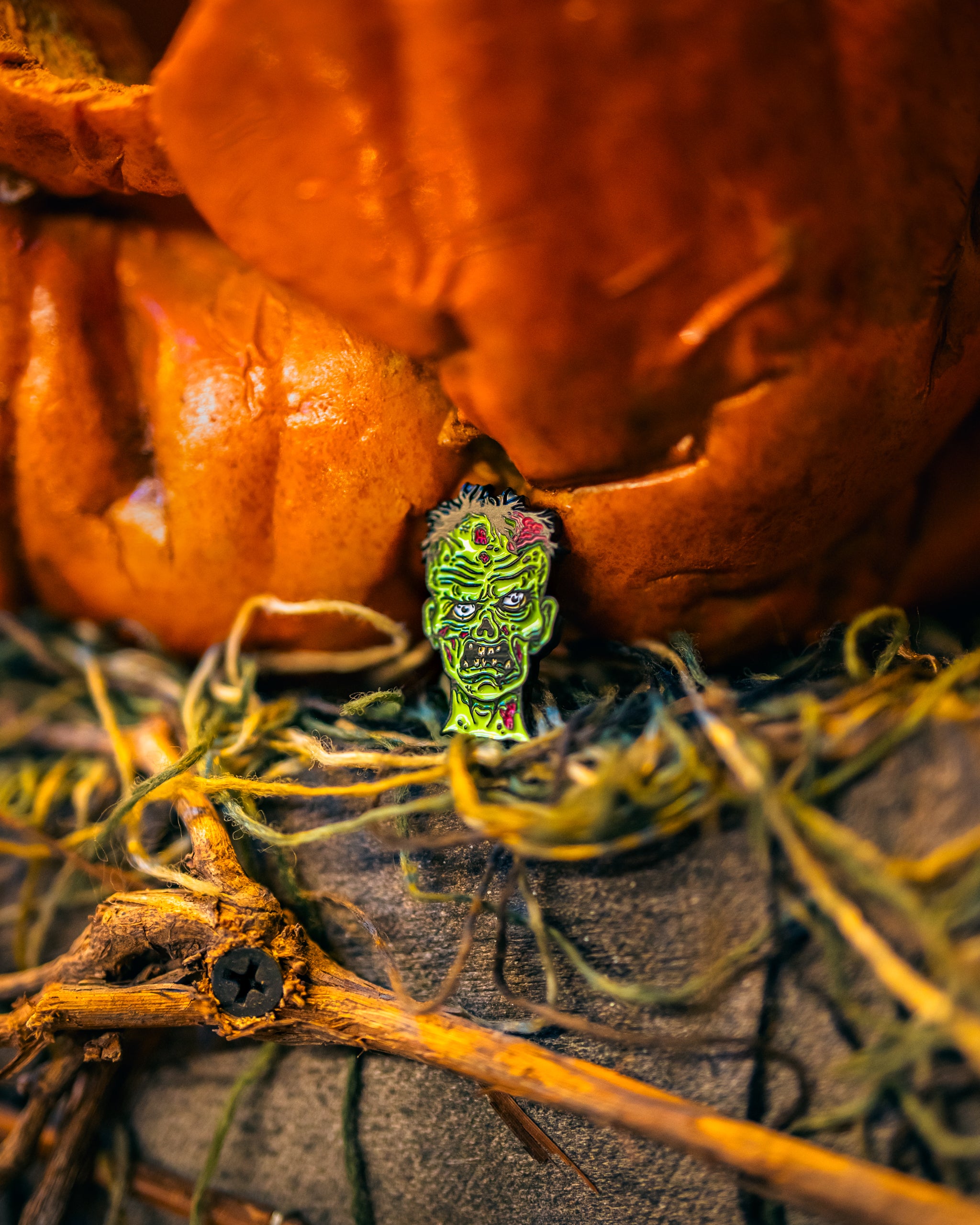 Mutant Zombie ball marker featuring a vibrant, cartoonish design with green skin and exaggerated features, set against a dark background.