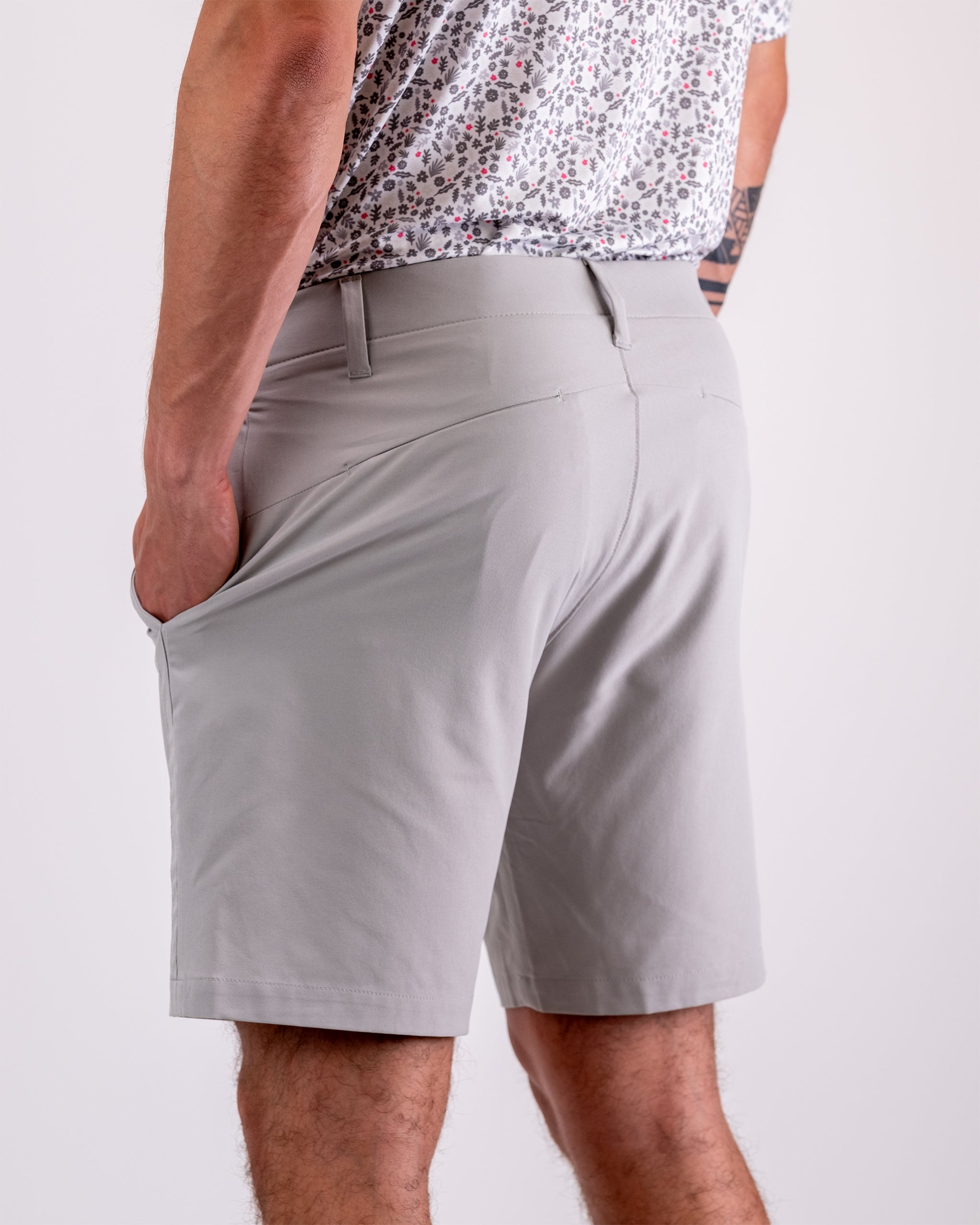 Performance shorts in dark stone color, featuring a sleek design and breathable fabric.