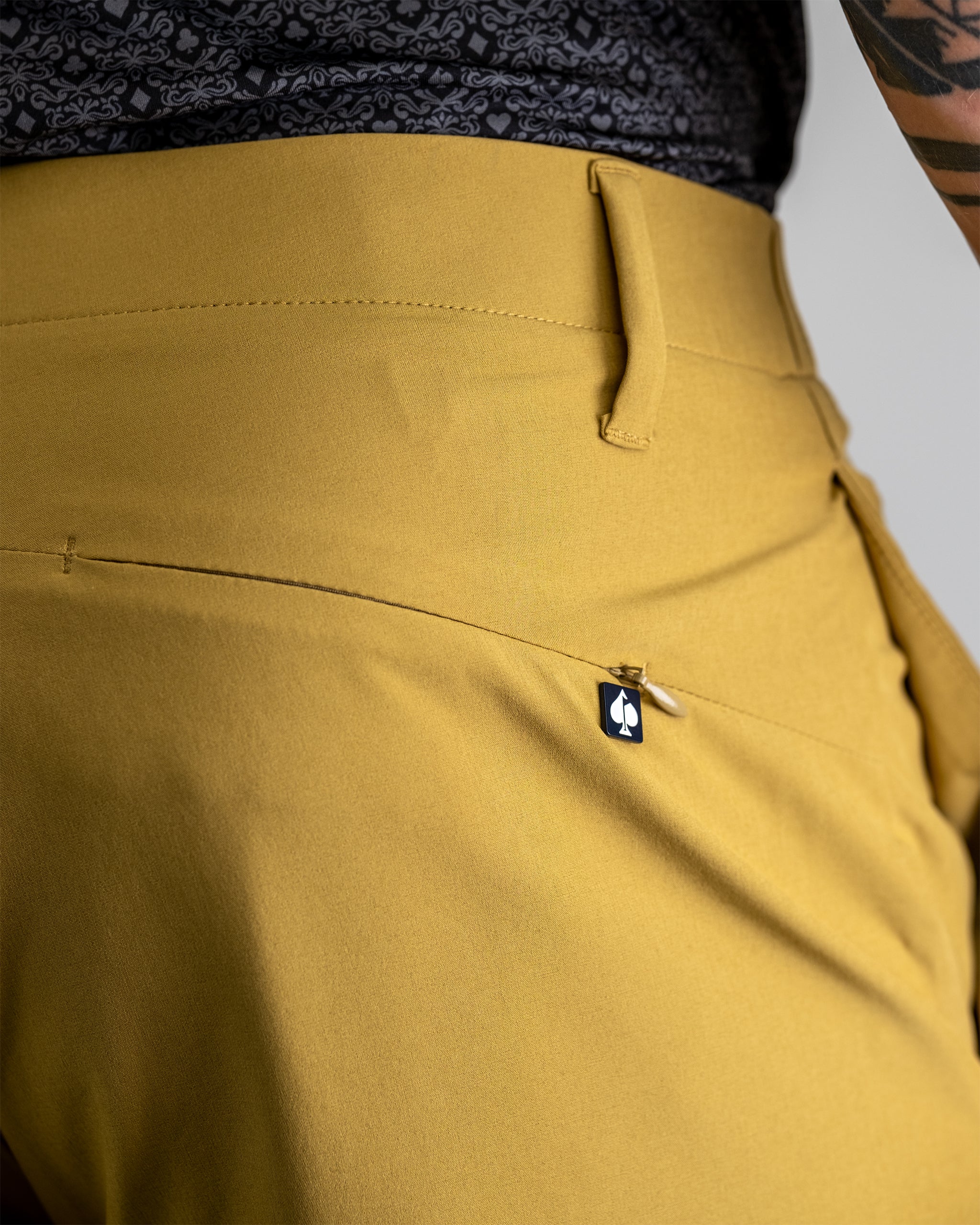 Performance Shorts in Dune color, showcasing a lightweight, breathable fabric ideal for athletic activities.