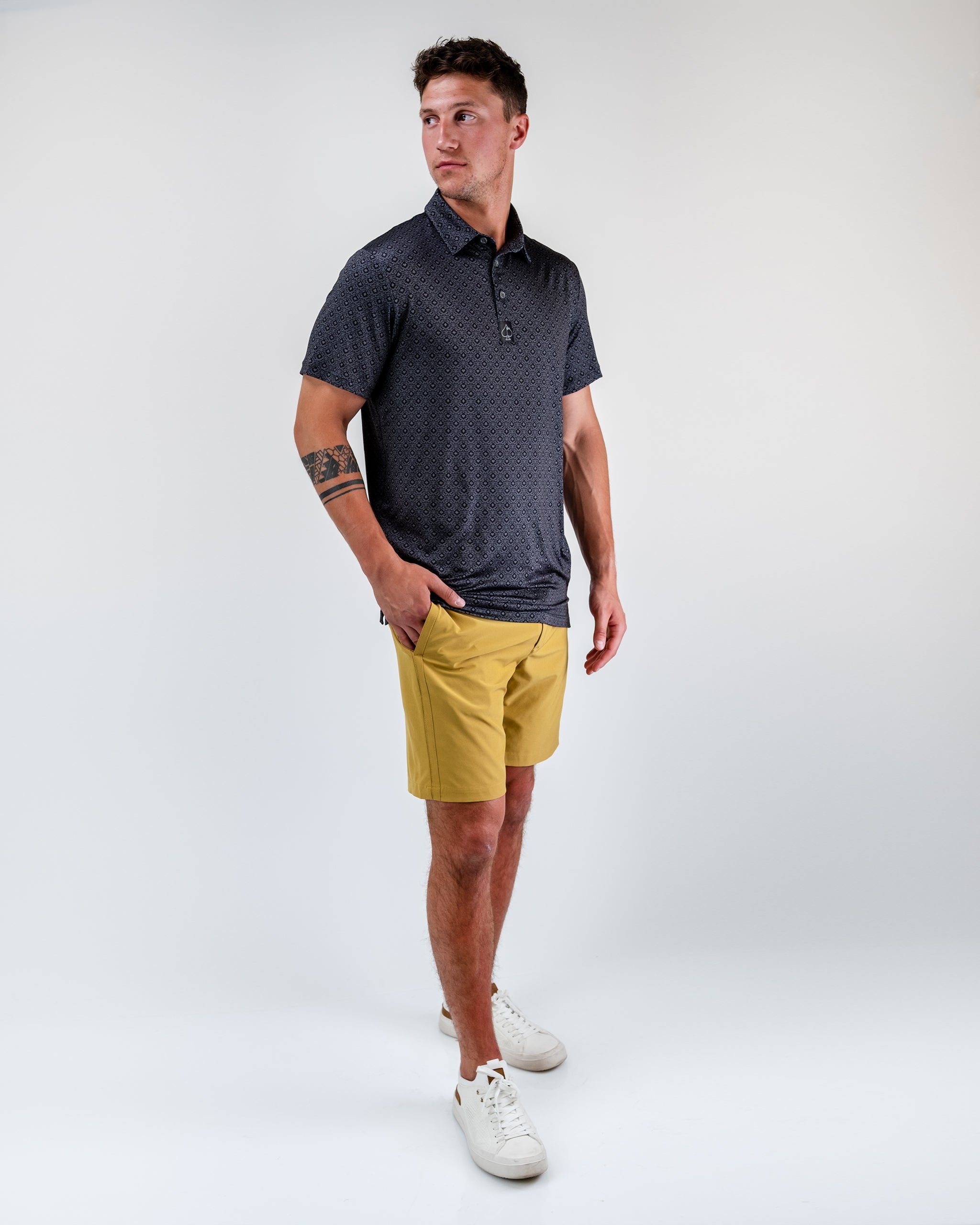 Men's performance shorts in a dune color, featuring a lightweight design and side pockets for functionality.