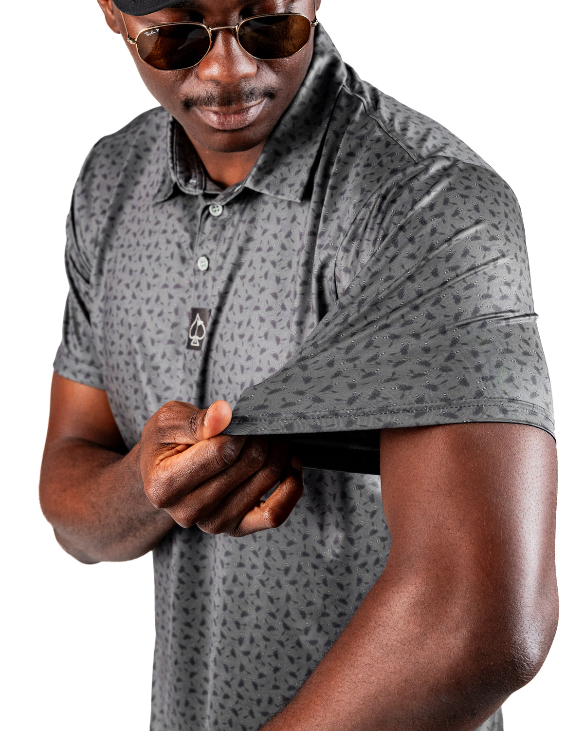 Men's Dry Fly golf polo shirt featuring a stylish pattern, showcasing comfort and performance on the course.