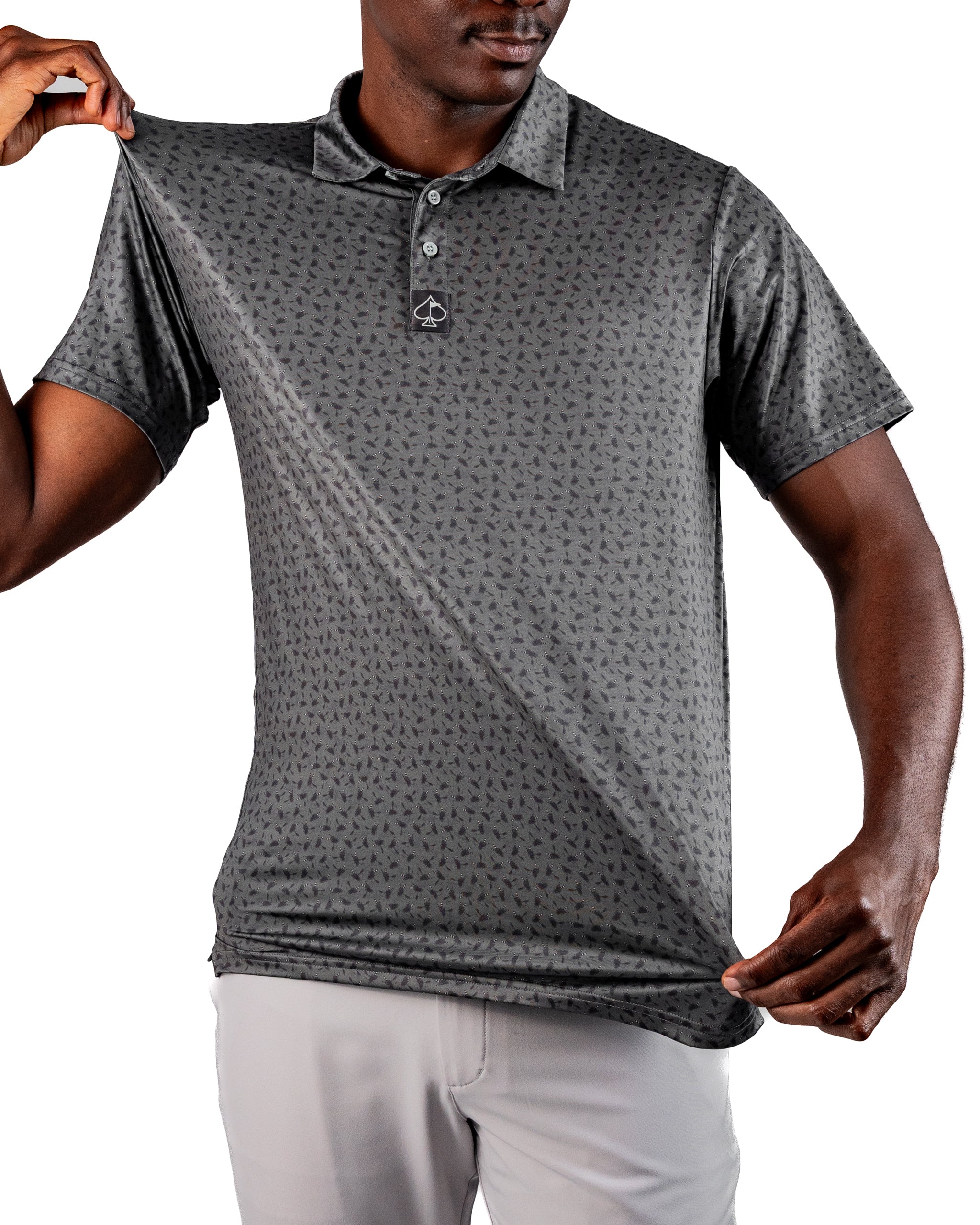 Men's Dry Fly golf polo in dark gray with a subtle pattern, showcasing a lightweight, moisture-wicking fabric.