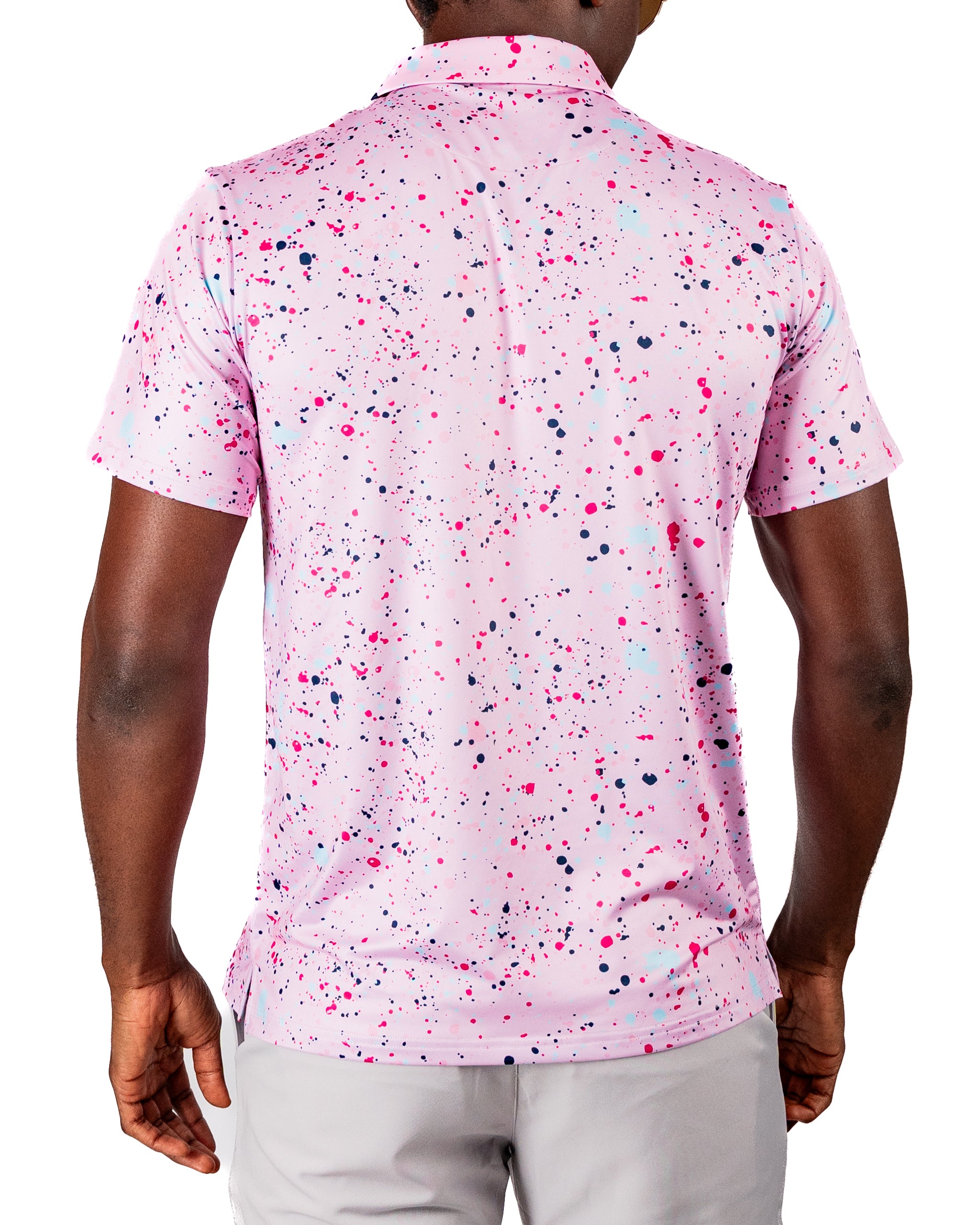 Men's pink golf shirt featuring a vibrant splatter design in various shades, perfect for making a bold statement on the course.